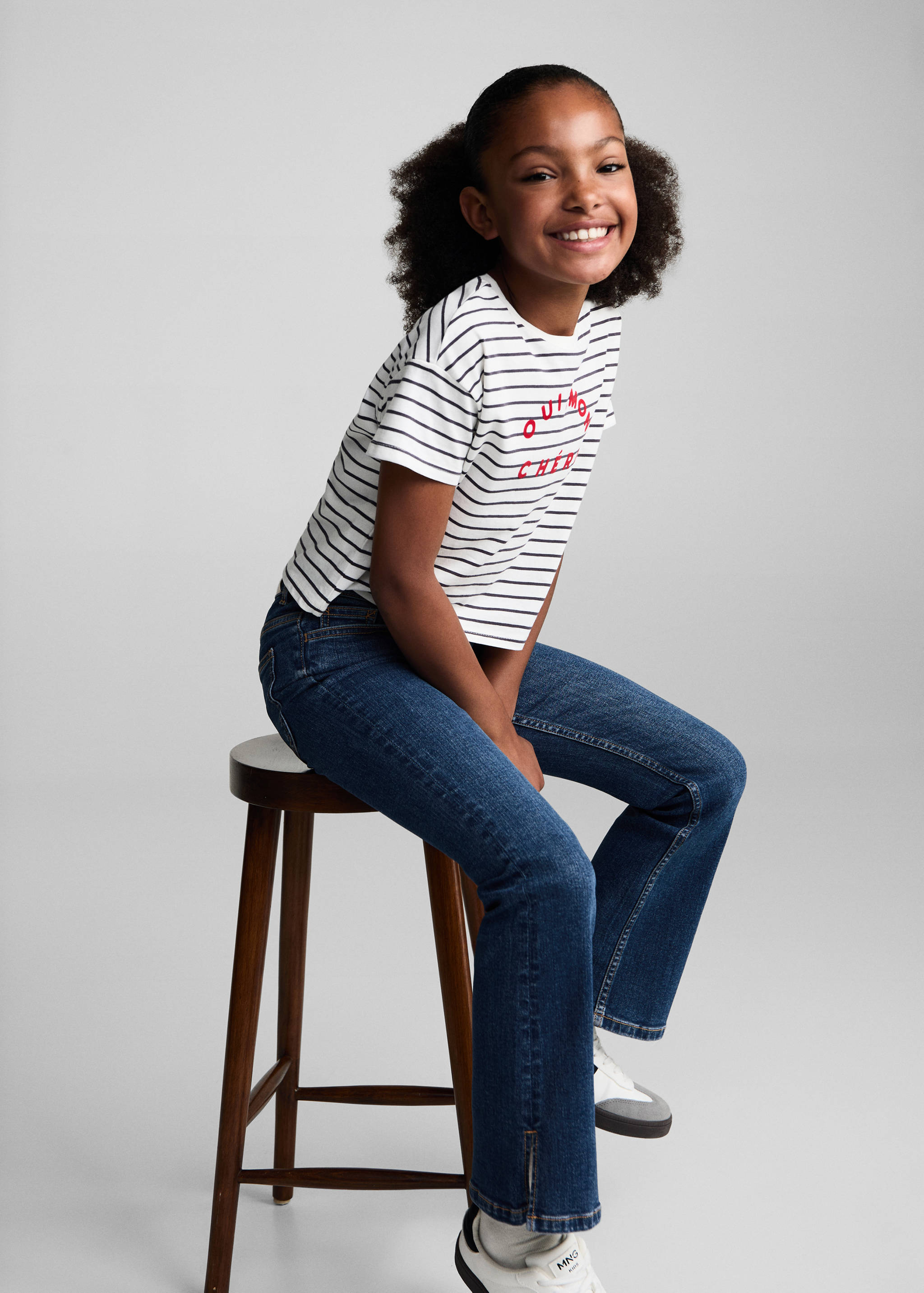 Flared jeans with opening - Details of the article 1