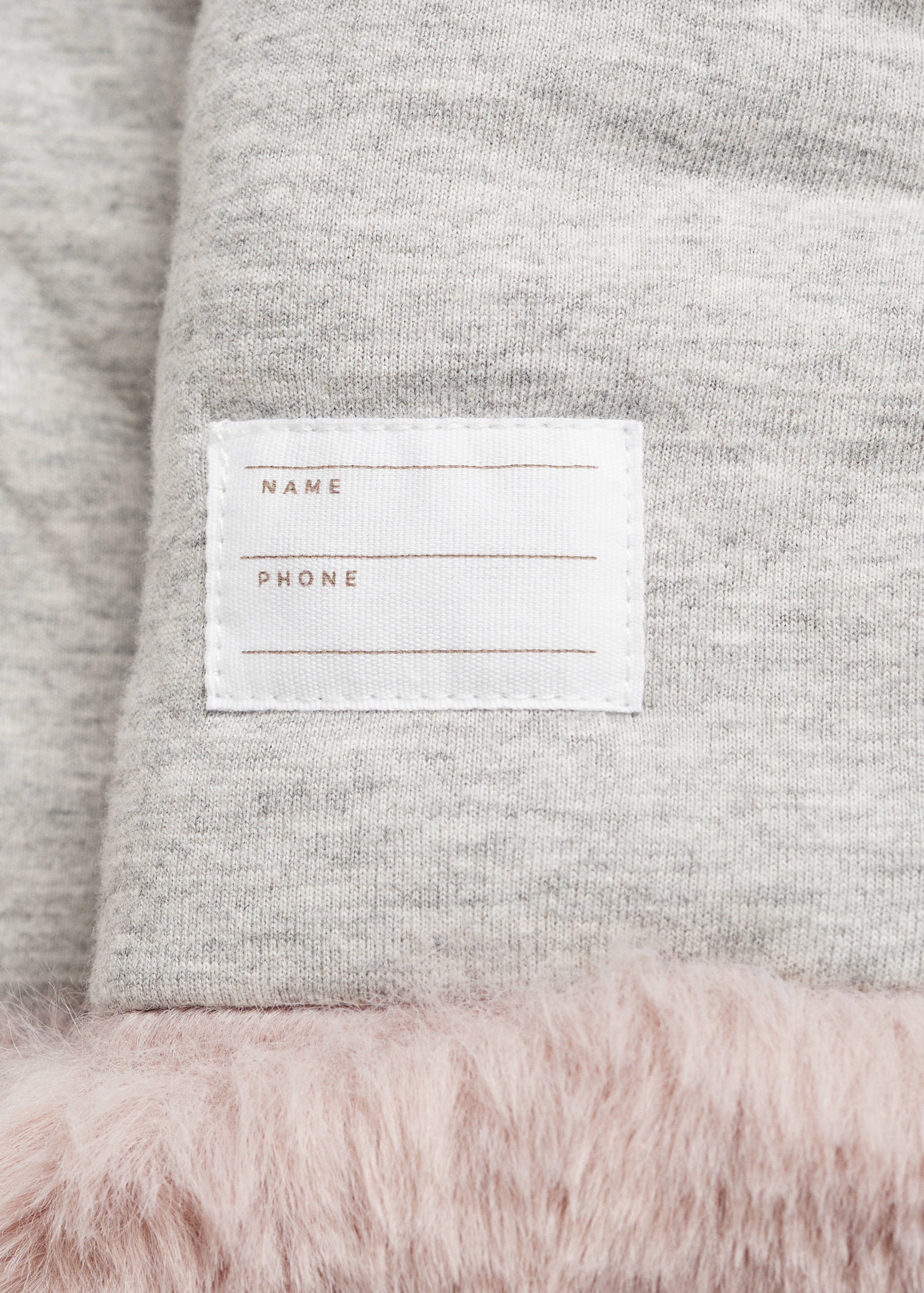 Jas met capuchon van imitatiebont - Detail van het artikel 0