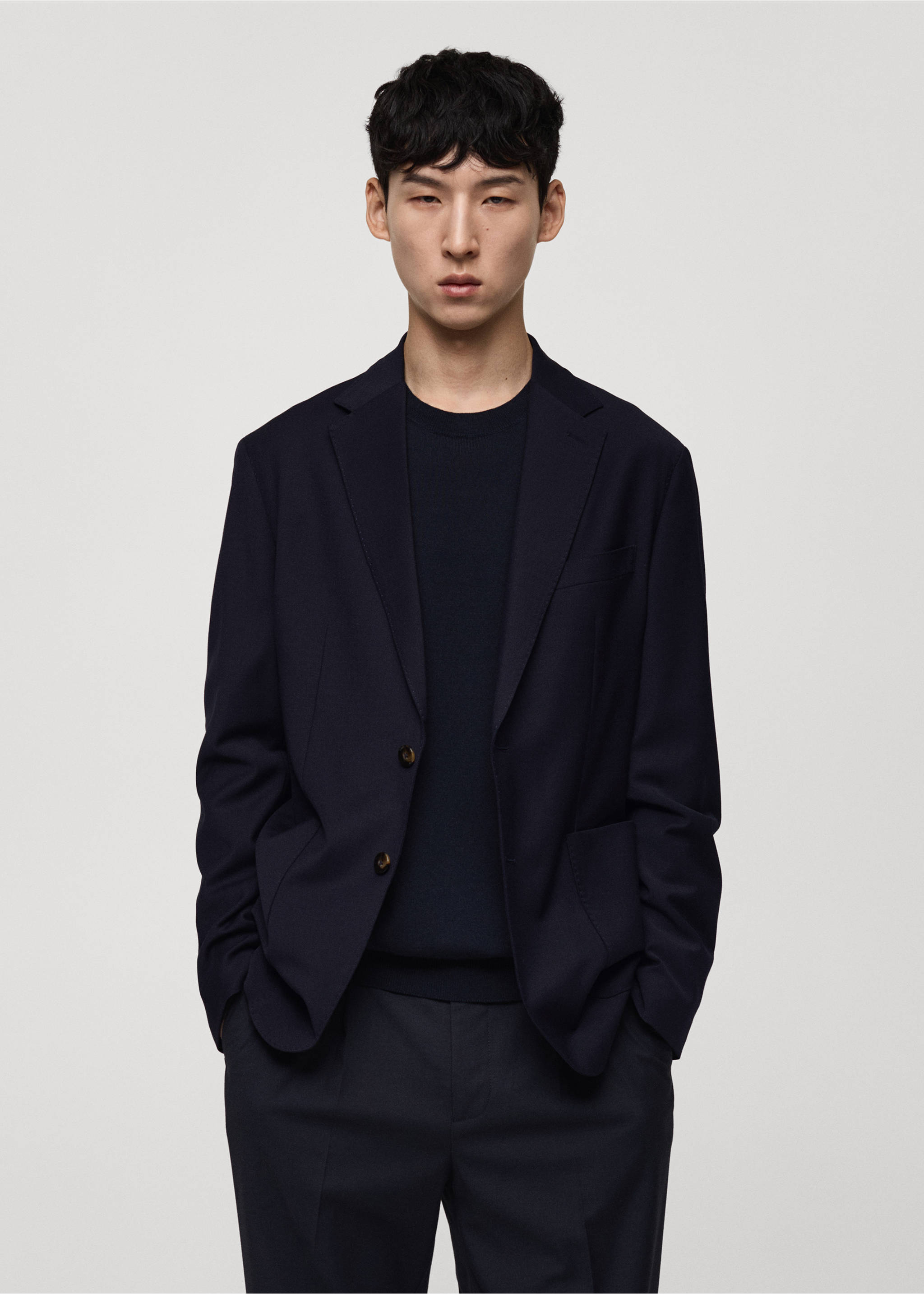 Blazer de lã slim fit com bolsos - Plano médio, Azul-marinho escuro. Ref: 77005975-00.