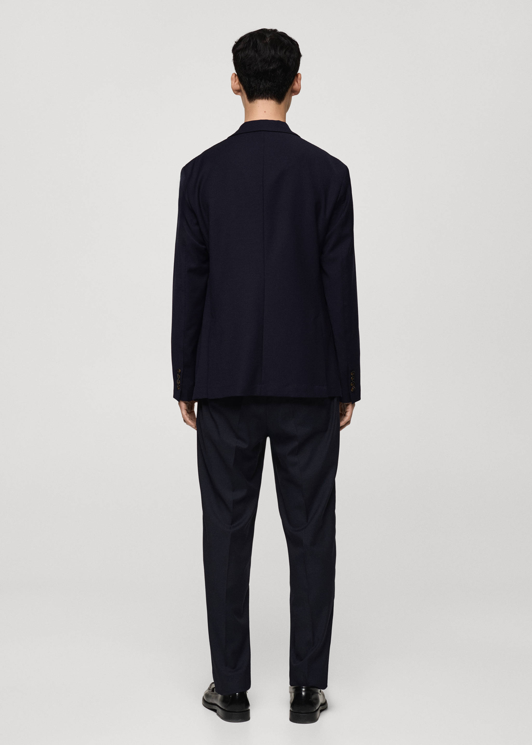 Blazer de lã slim fit com bolsos - Verso do artigo