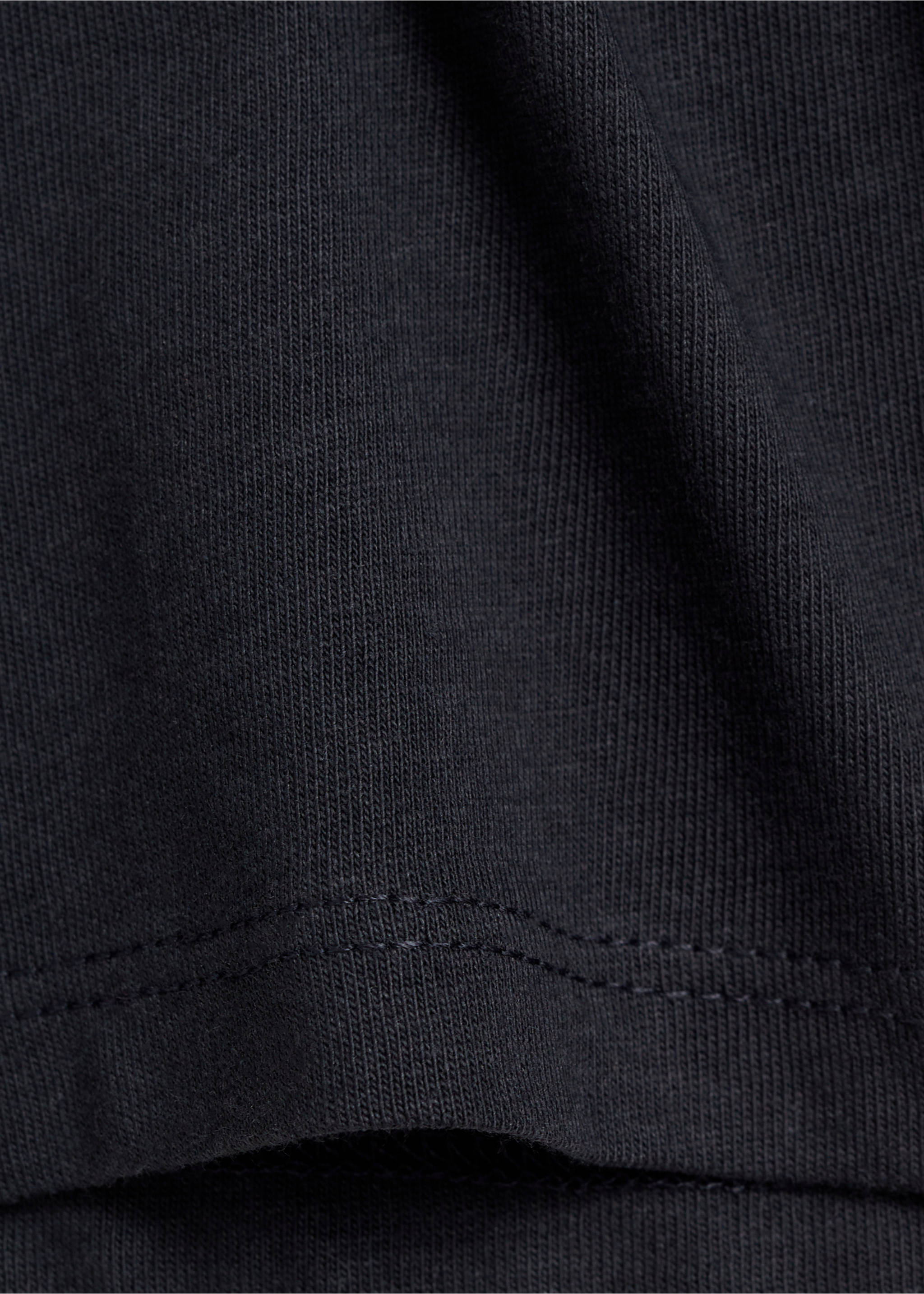 T-shirt manches longues poches - Détail de l'article 0, Noir. Ref: 77006734-00.
