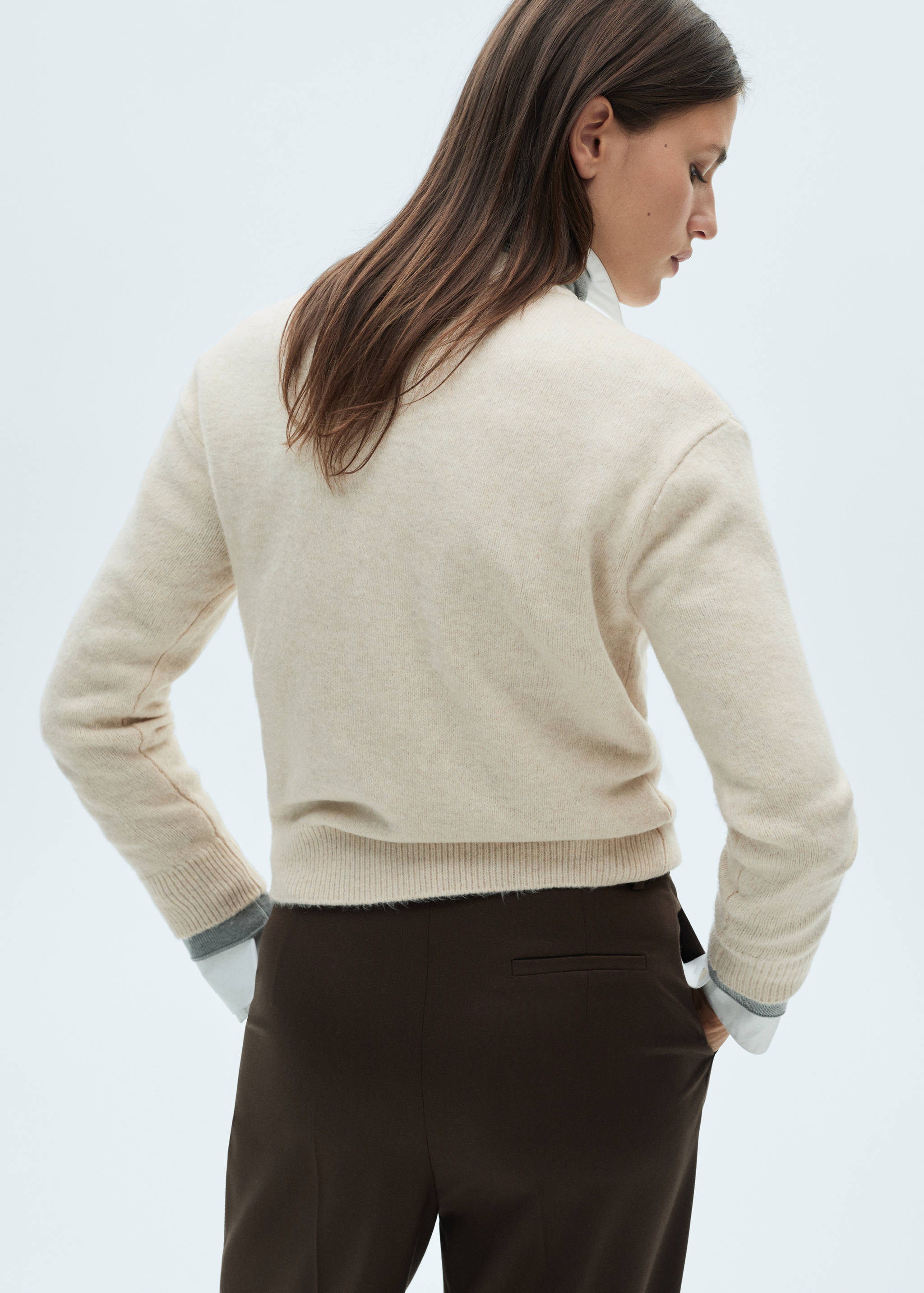 Round-neck knitted sweater - Reverse of the article