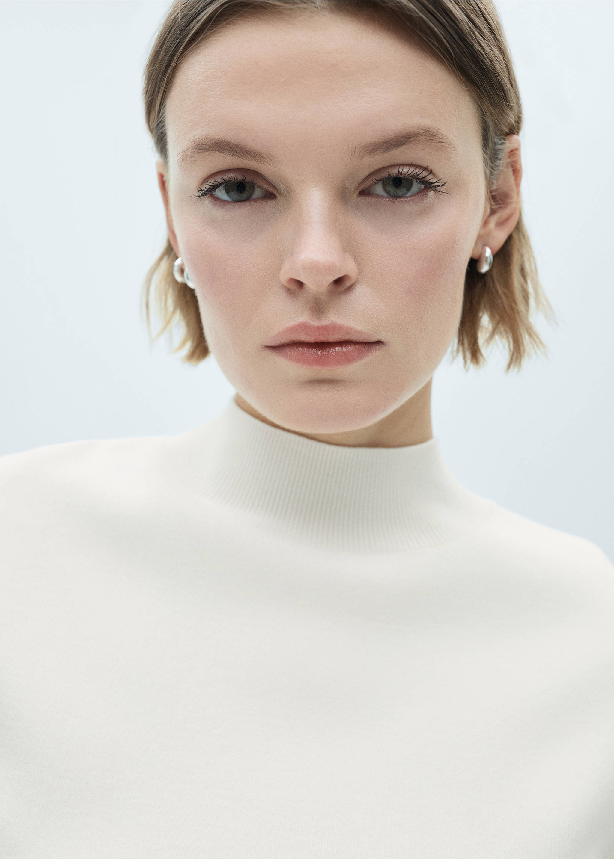 Knitted sweater with perkins neck - Details of the article 1, Ecru. Ref: 77007697-00.