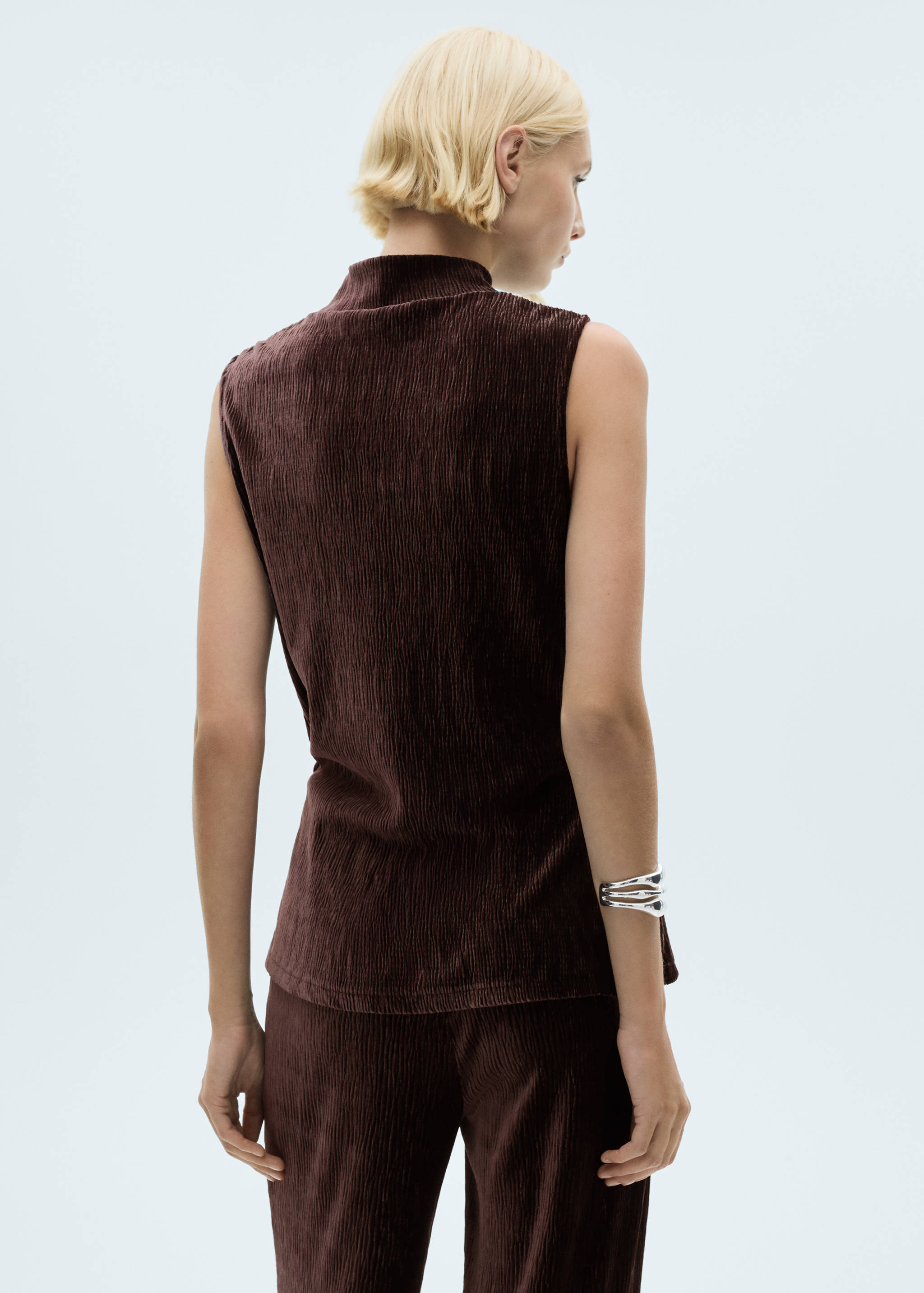 Sammetstopp perkinskrage - Artikelns baksida