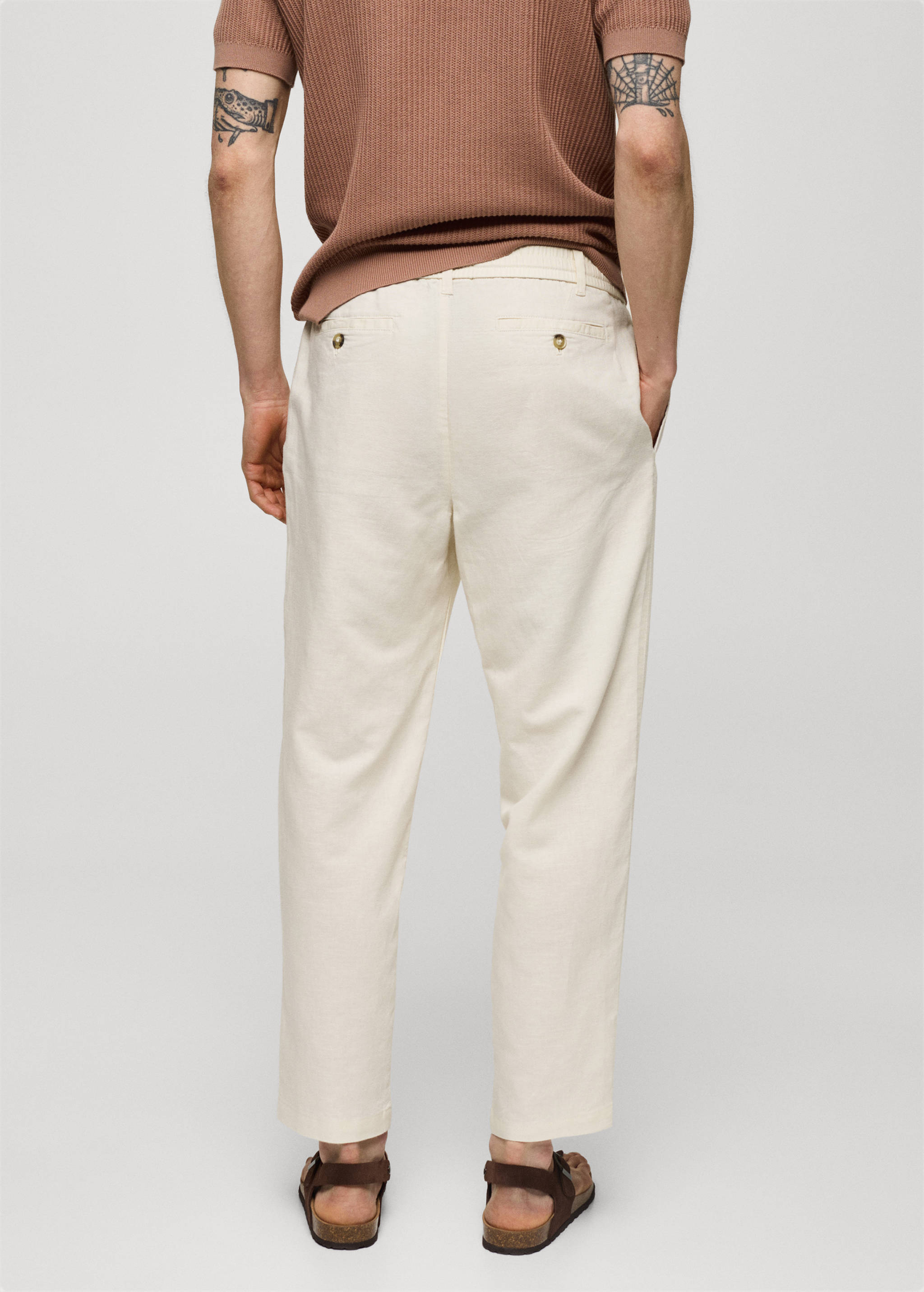 Slim-fit trousers with drawstring - Reverse of the article