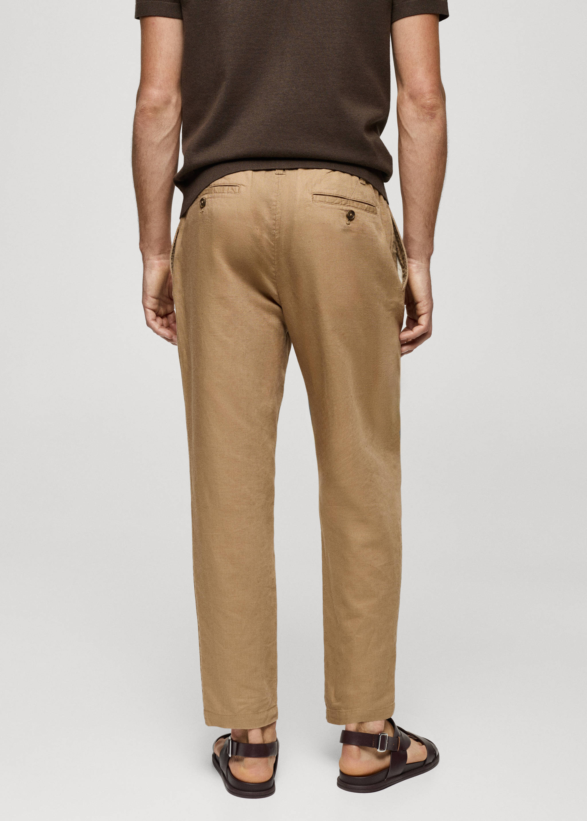 Slim-fit trousers with drawstring - Reverse of the article