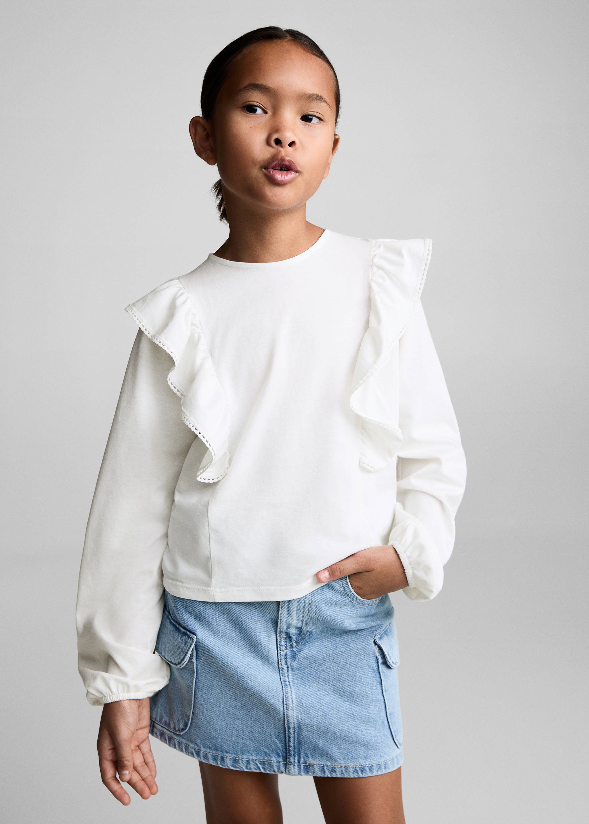 Volangblus med detaljer - Bild av mittparti