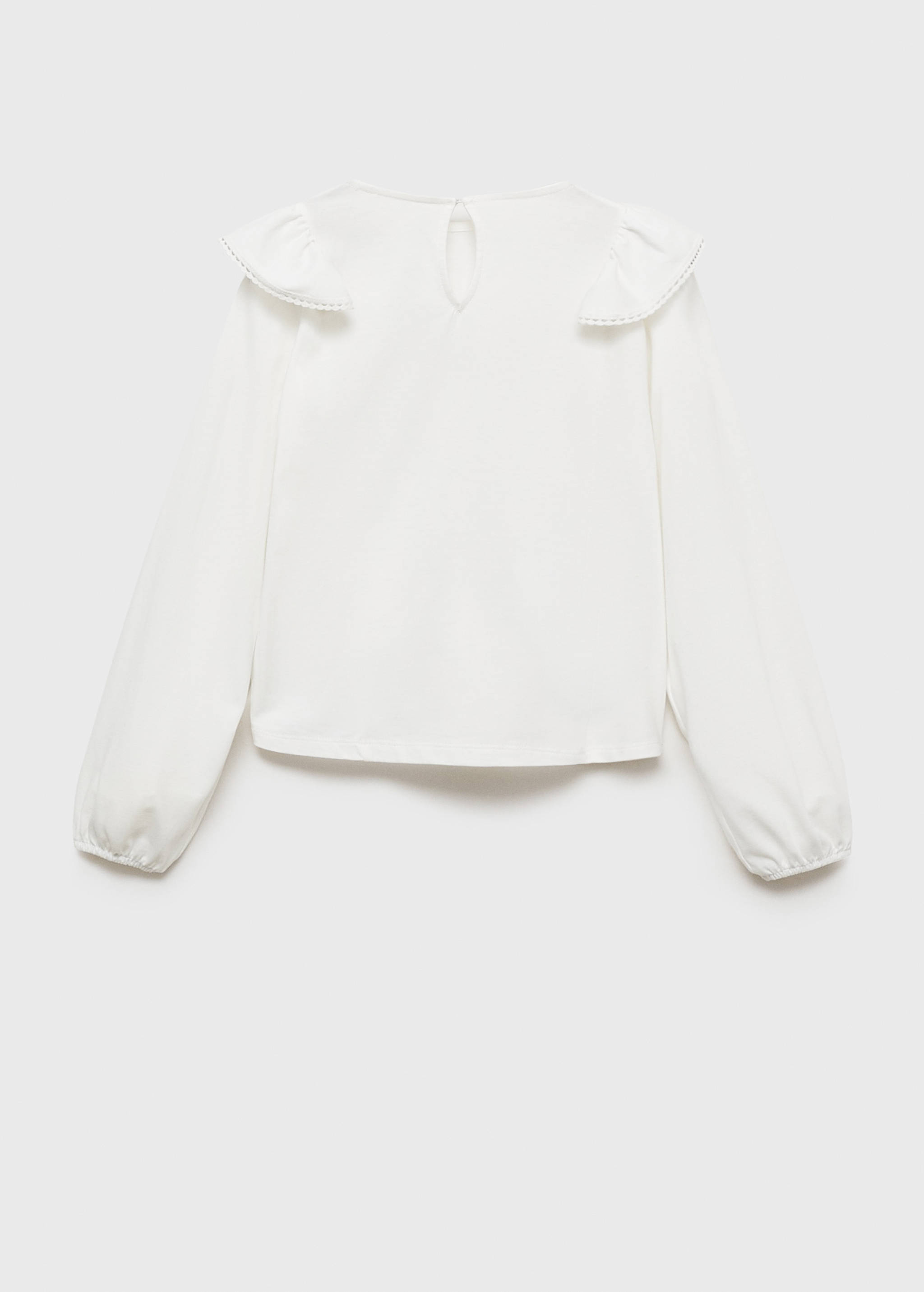 Volangblus med detaljer - Artikelns baksida