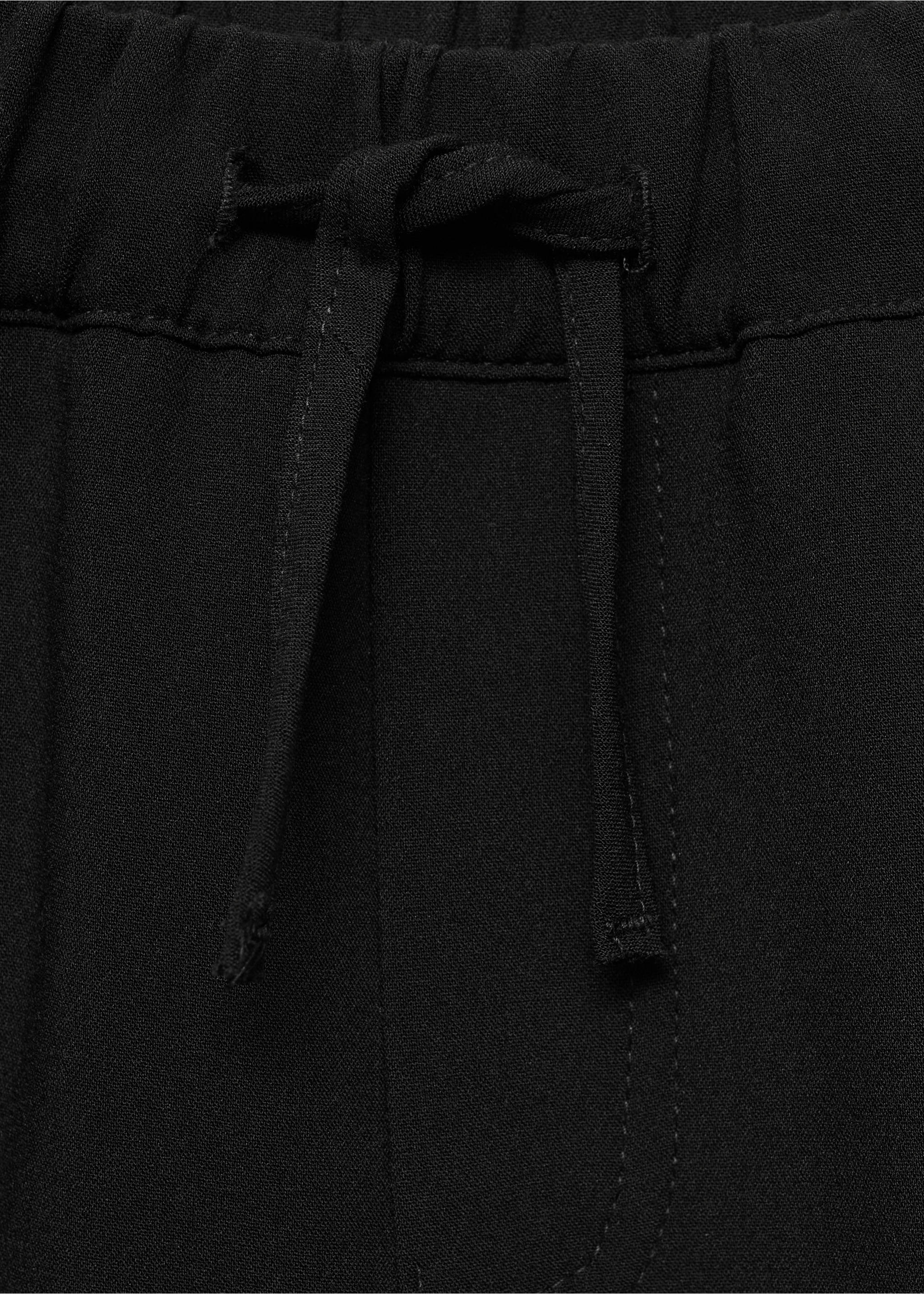 Splývavé kalhoty cargo - Detail zboží 8, Černá. Ref: 77016735-00.