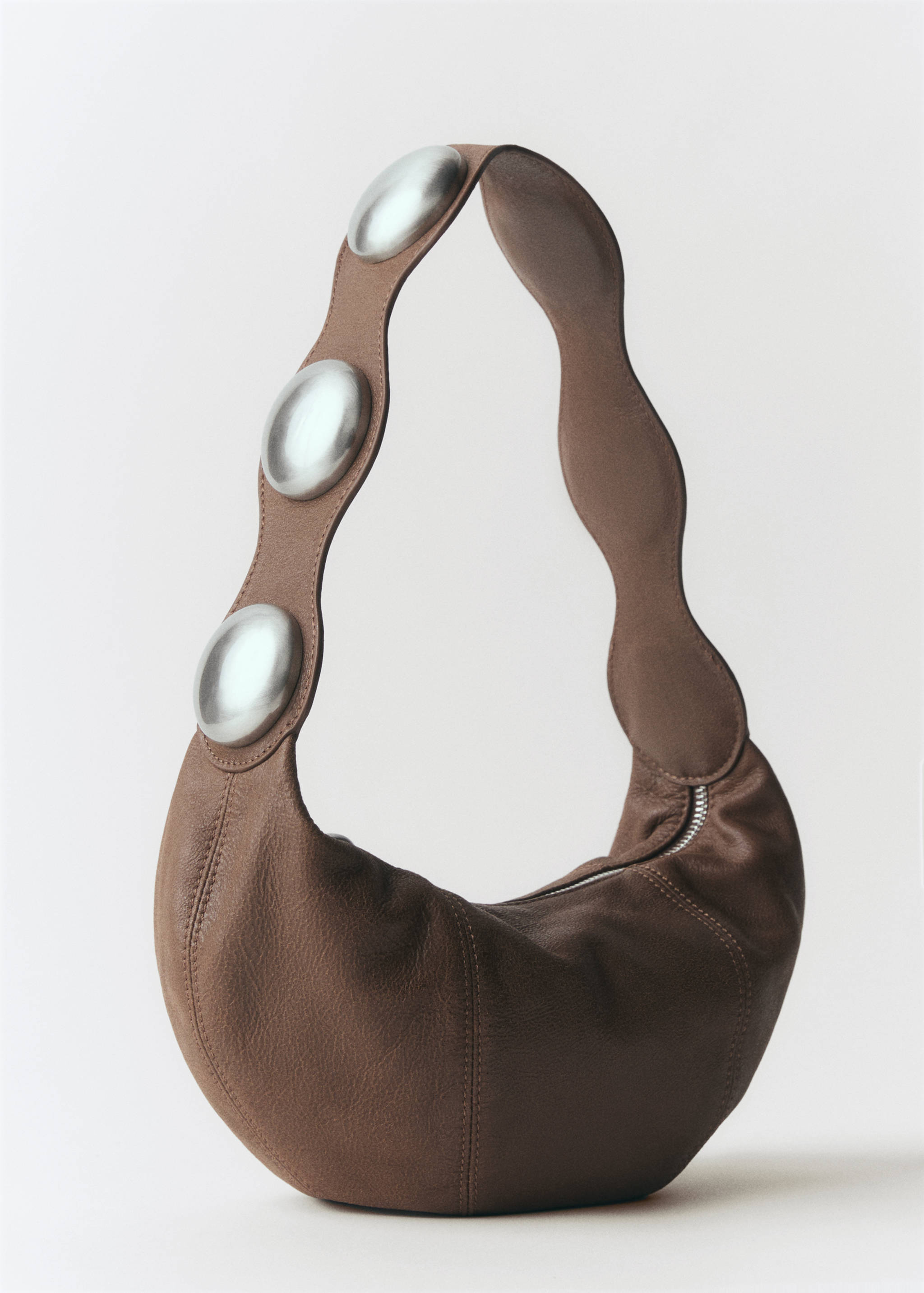 Borsa pelle borchie - Piano medio