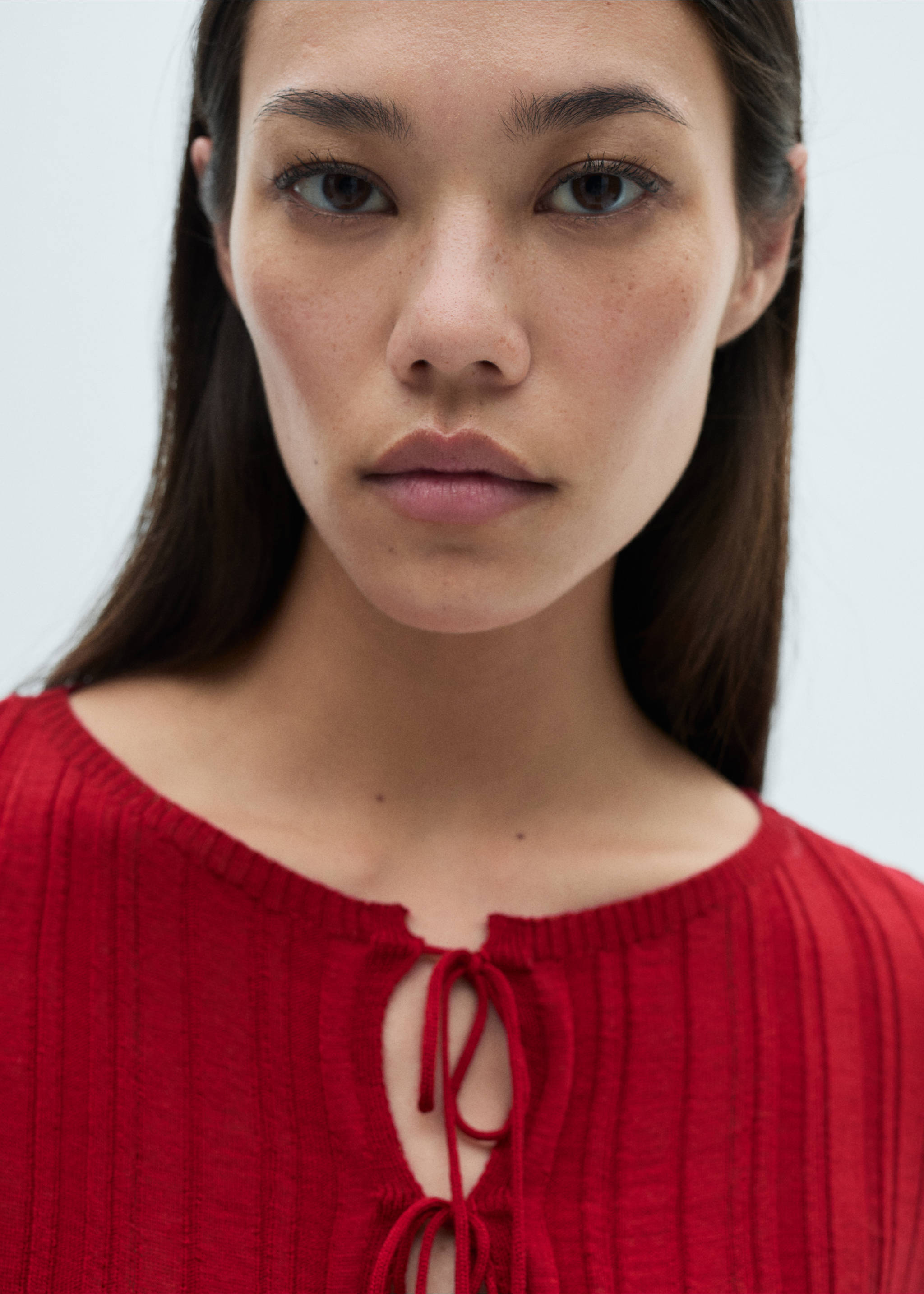 Strickcardigan mit Schleifen - Detail des Artikels 1, Rot. Ref: 77017715-00.