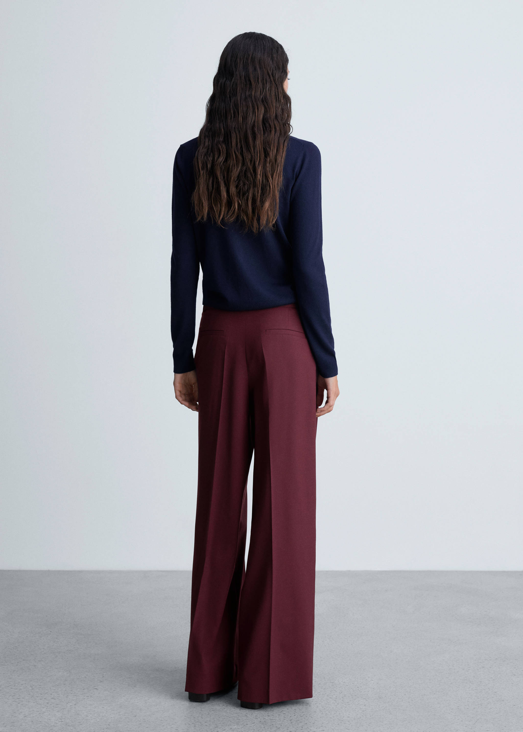 Wide leg pleated wool trousers - Reverse of the article
