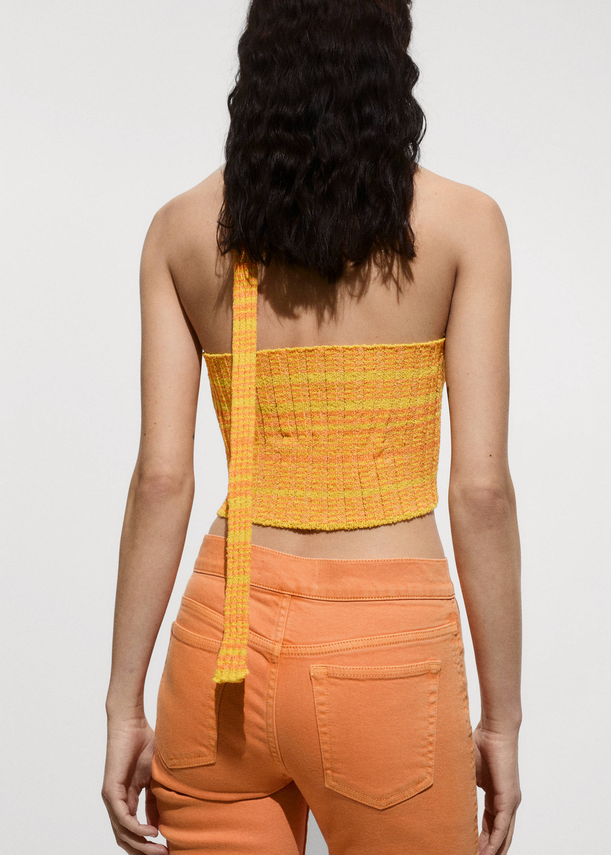 Top punto asimétrico - Reverso del artículo