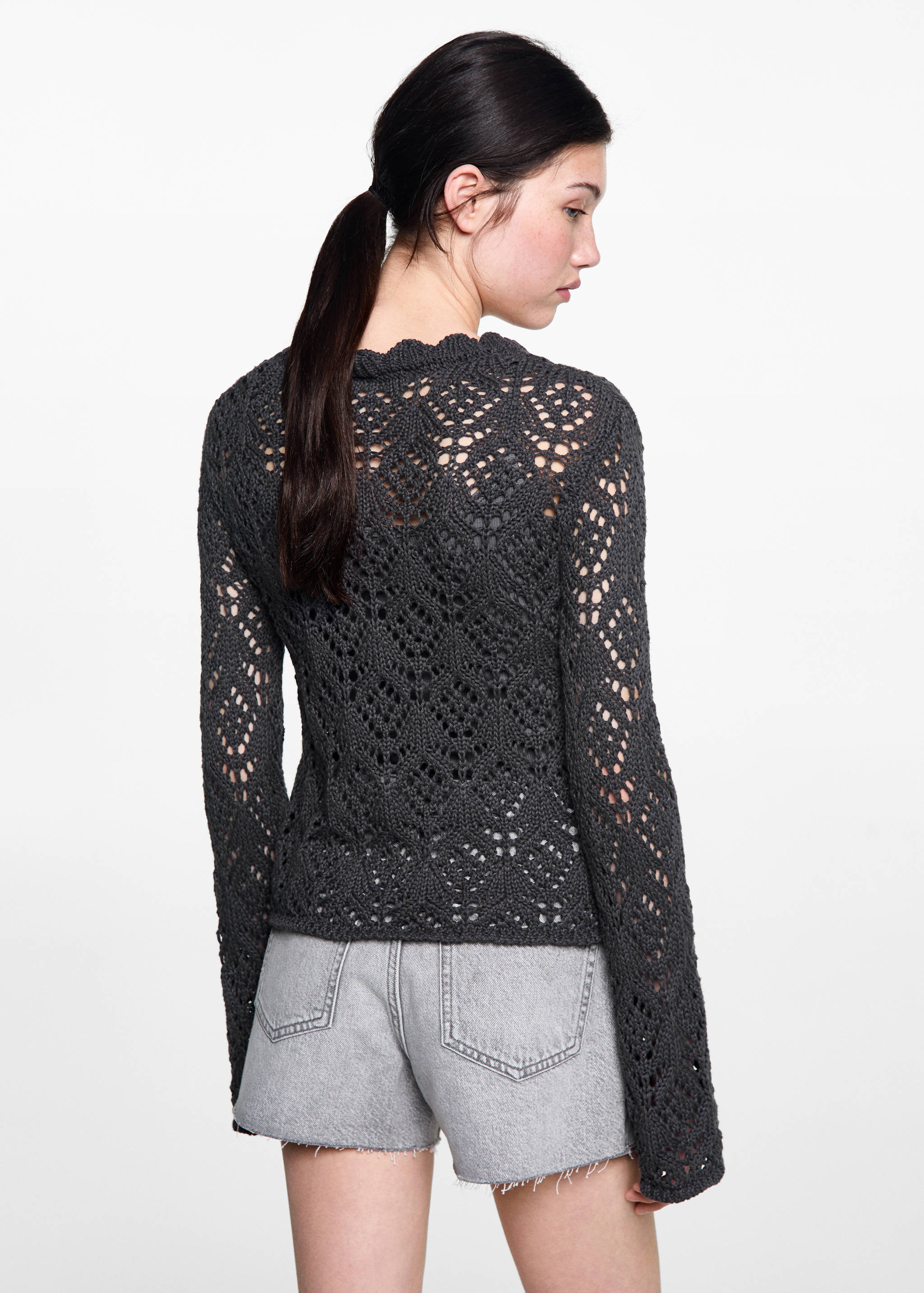 Pull en maille ajourée - Verso de l’article