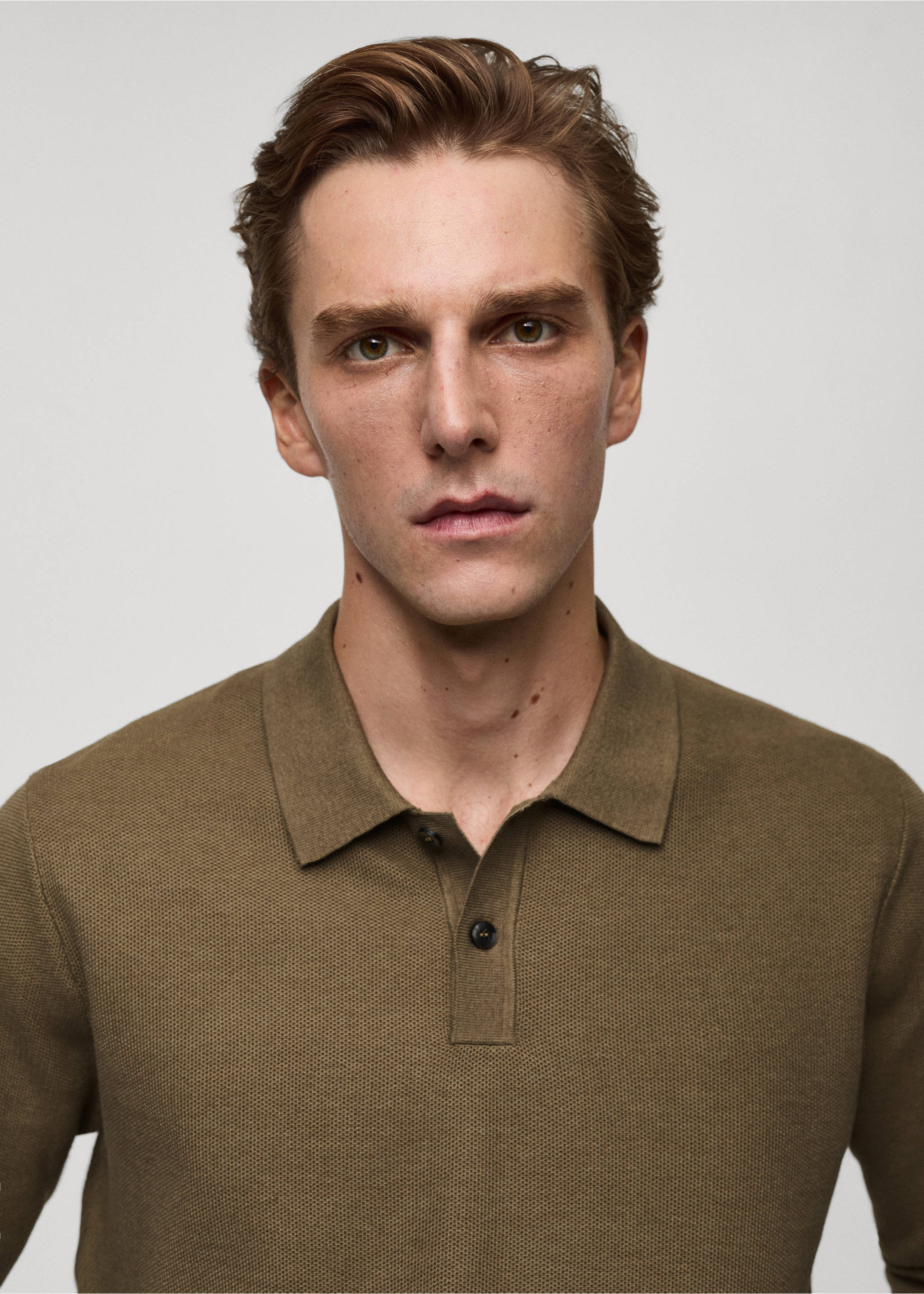 Knitted structured polo sweater - Details of the article 1, Medium Green. Ref: 77024449-00.