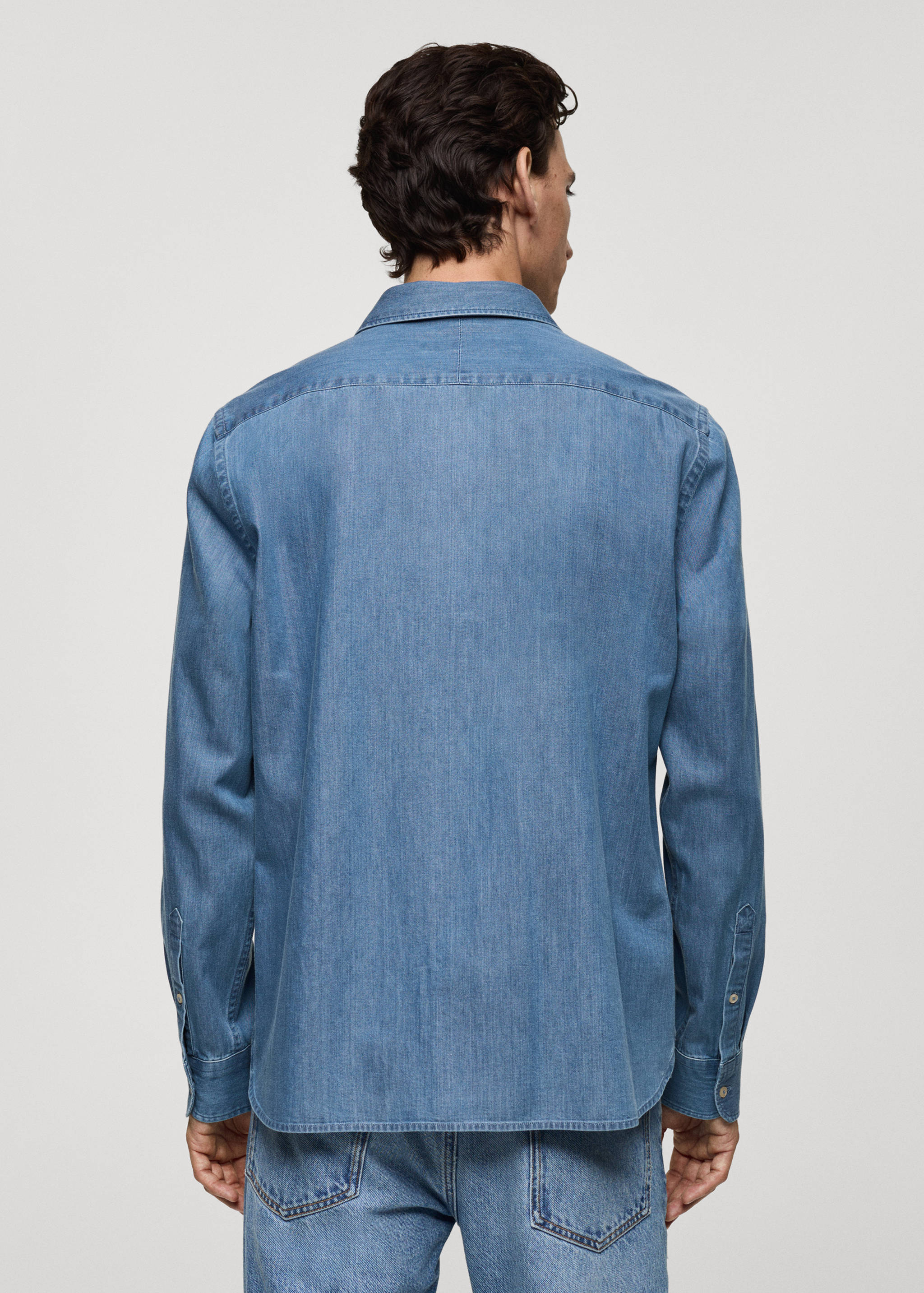 Denim overshirt with regular fit pockets - Reverse of the article
