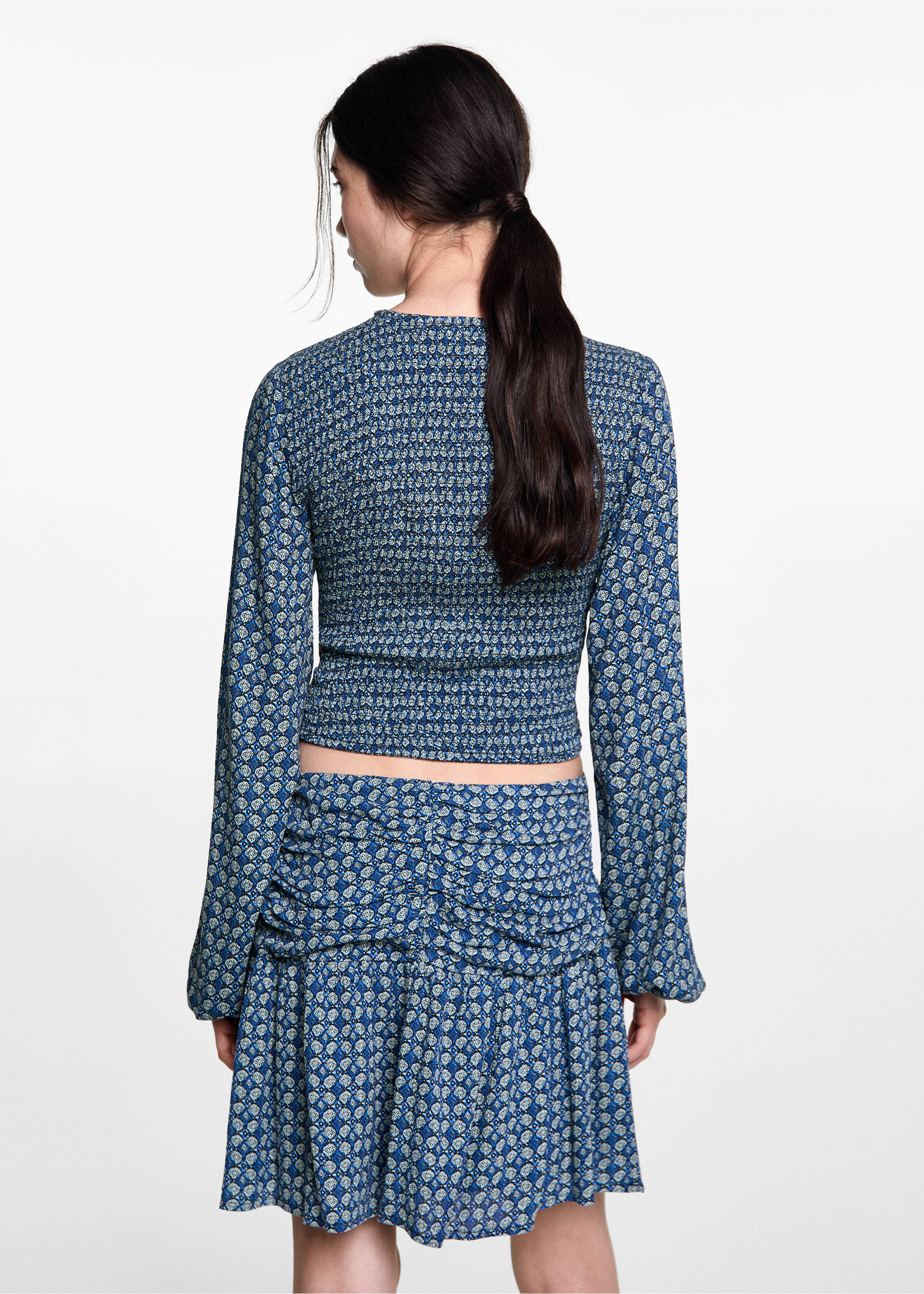 Printed pleated skirt - Reverse of the article, Dark Navy. Ref: 77024788-00.