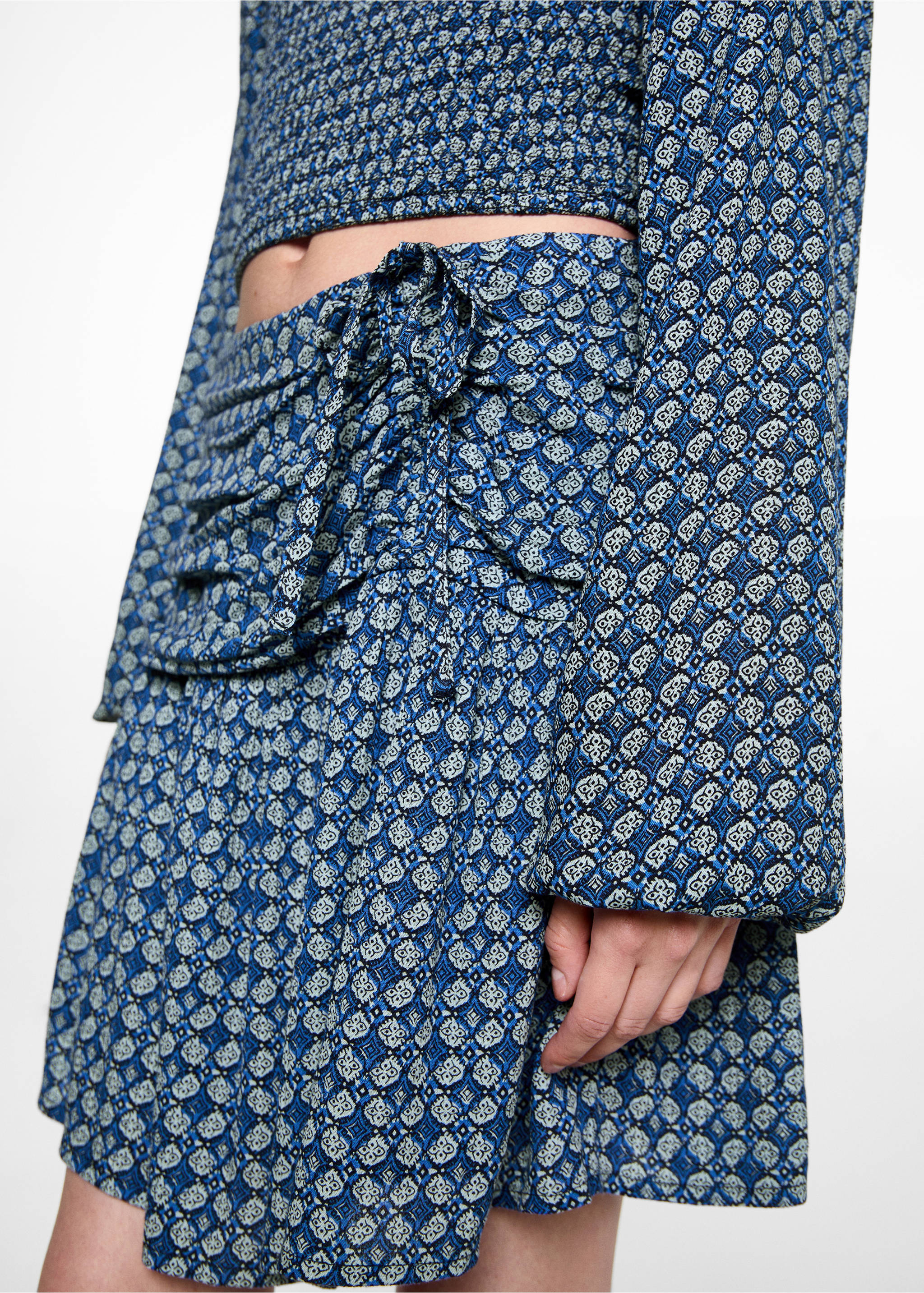 Printed pleated skirt - Details of the article 6, Dark Navy. Ref: 77024788-00.