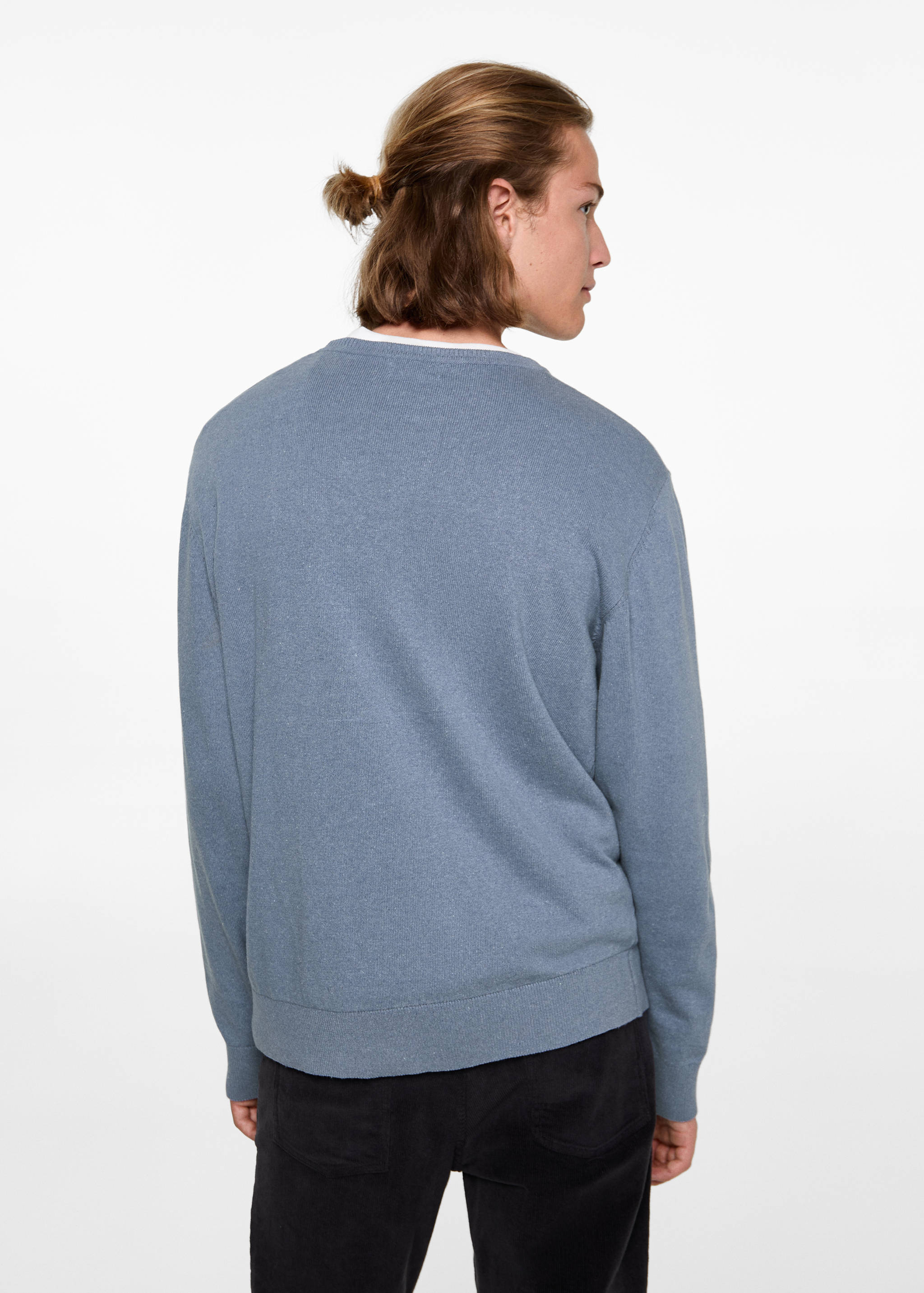 Round-neck knitted sweater - Reverse of the article