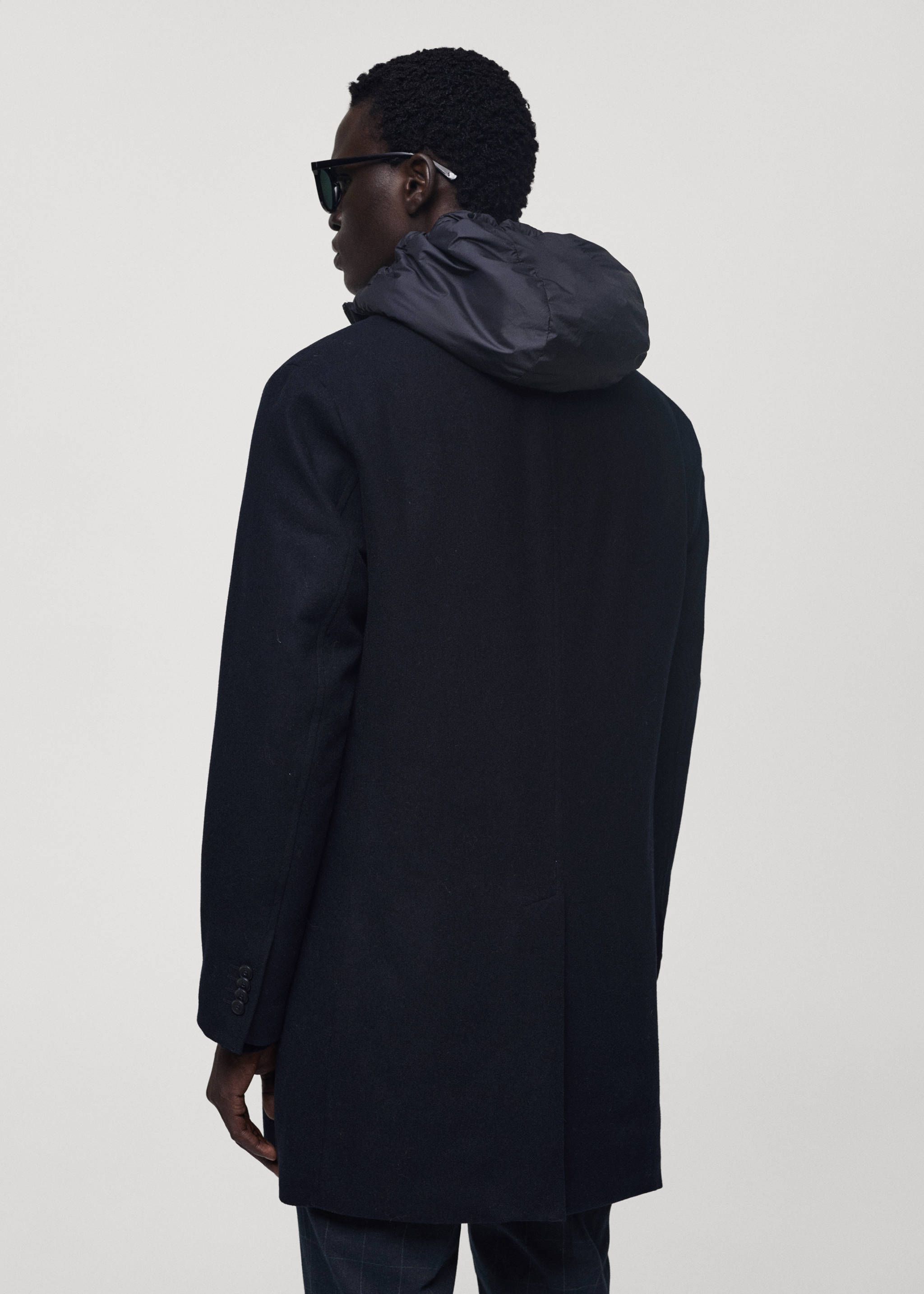 Wool coat with quilted interior hood - Reverse of the article