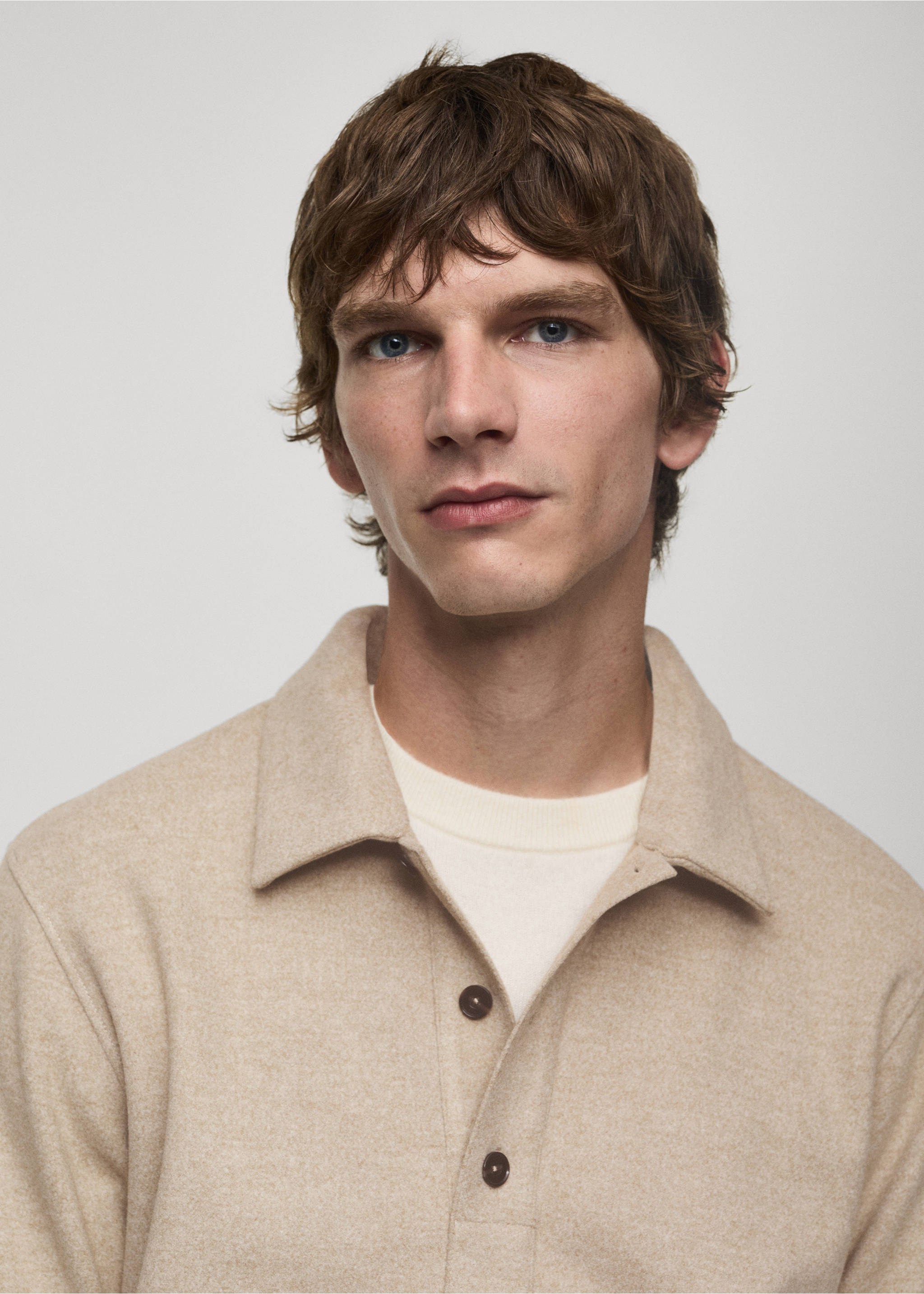 Polo regular fit teixit dessuadora - Detall de l'article 1, Sorra. Ref: 77027925-00.