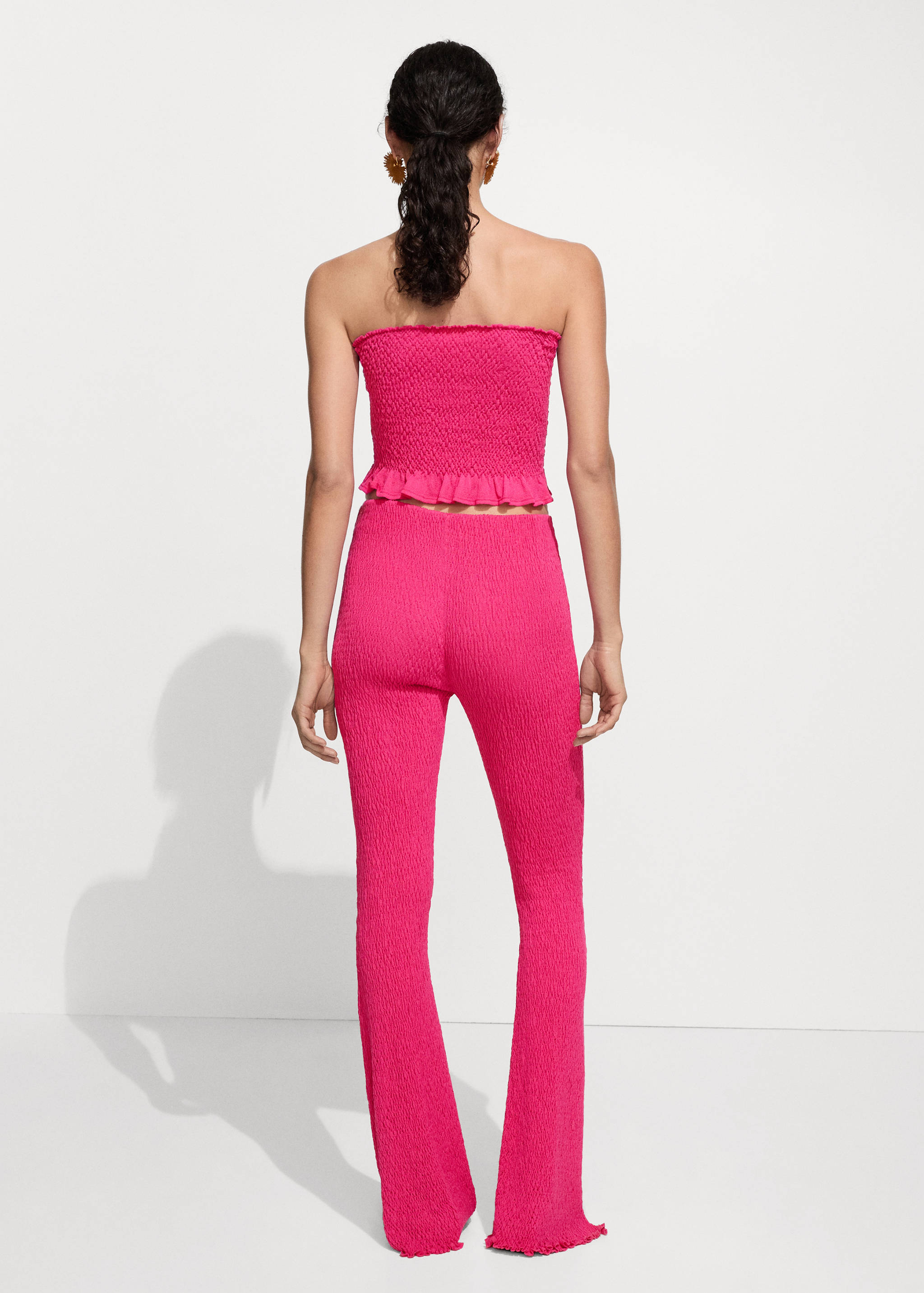 Braided knitted trousers - Reverse of the article