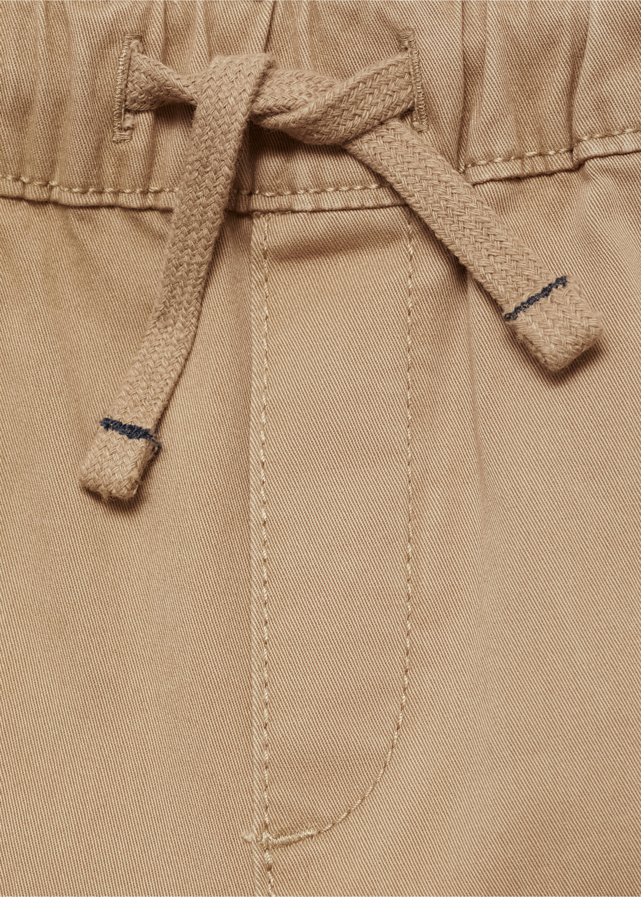 Elastic waist trousers - Details of the article 8, Sand. Ref: 77034013-00.