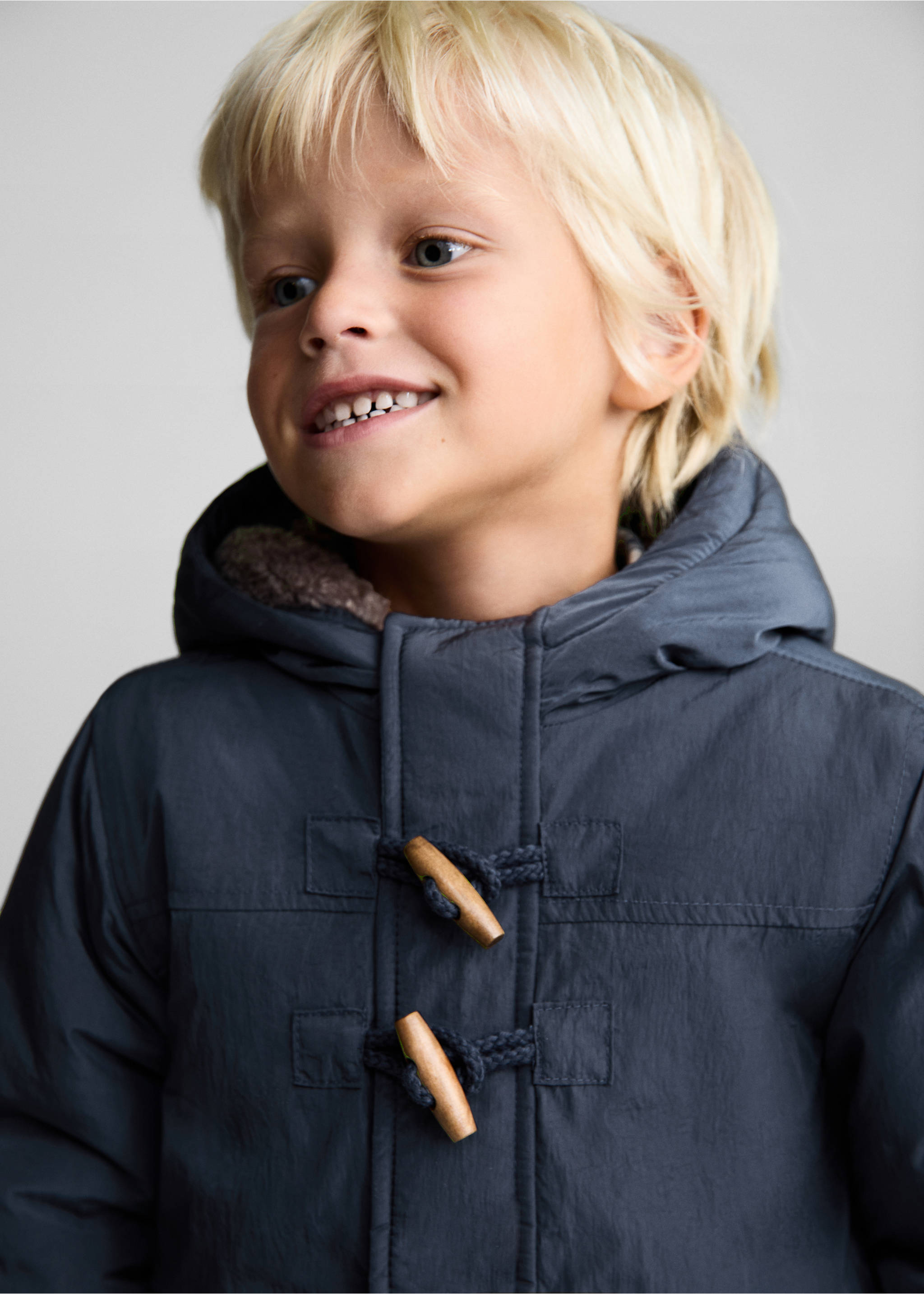 Padded anorak with shearling lining - Details of the article 1, Blue. Ref: 77035148-00.