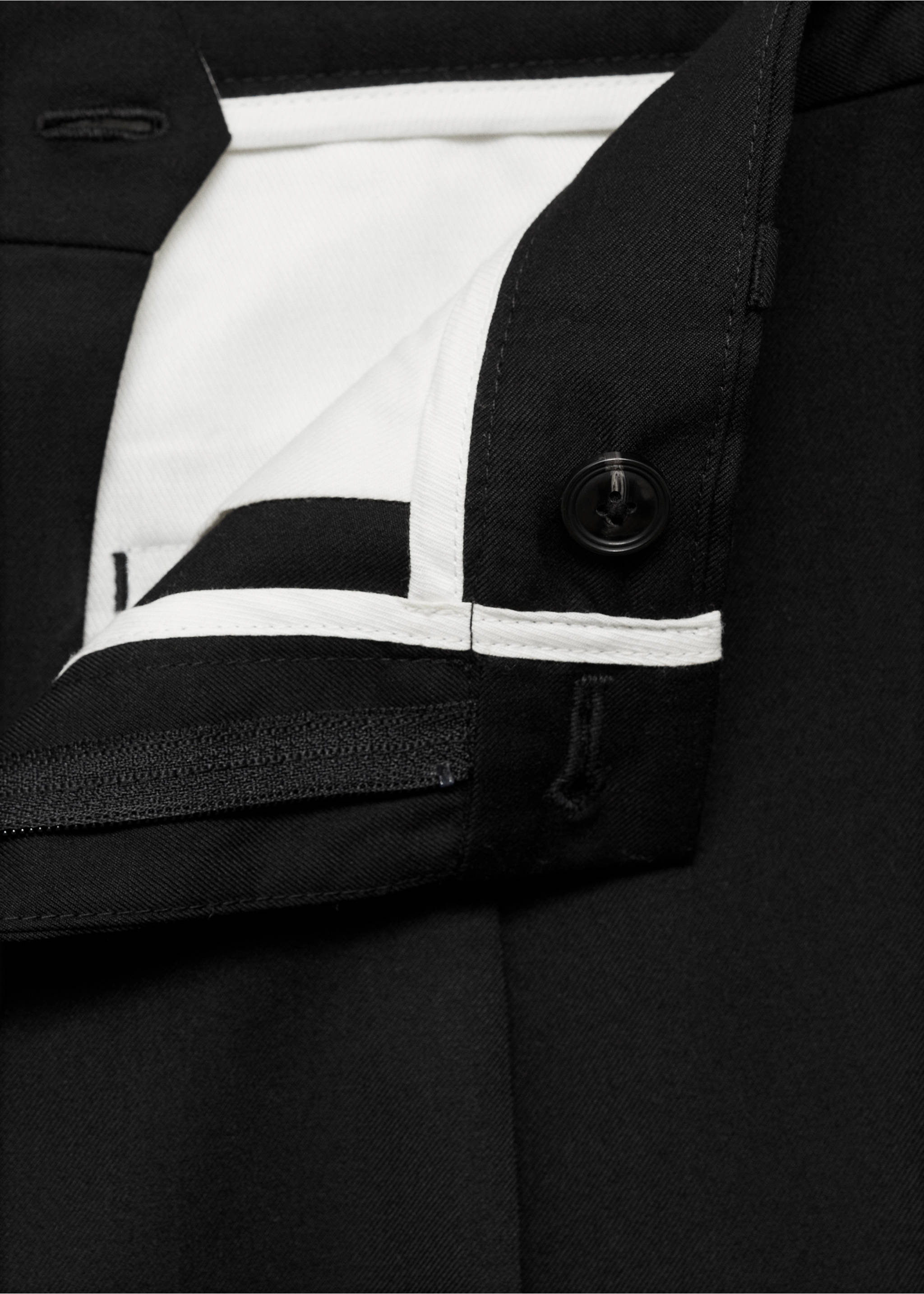 Regular-fit pleated trousers - Details of the article 8, Black. Ref: 77035965-00.