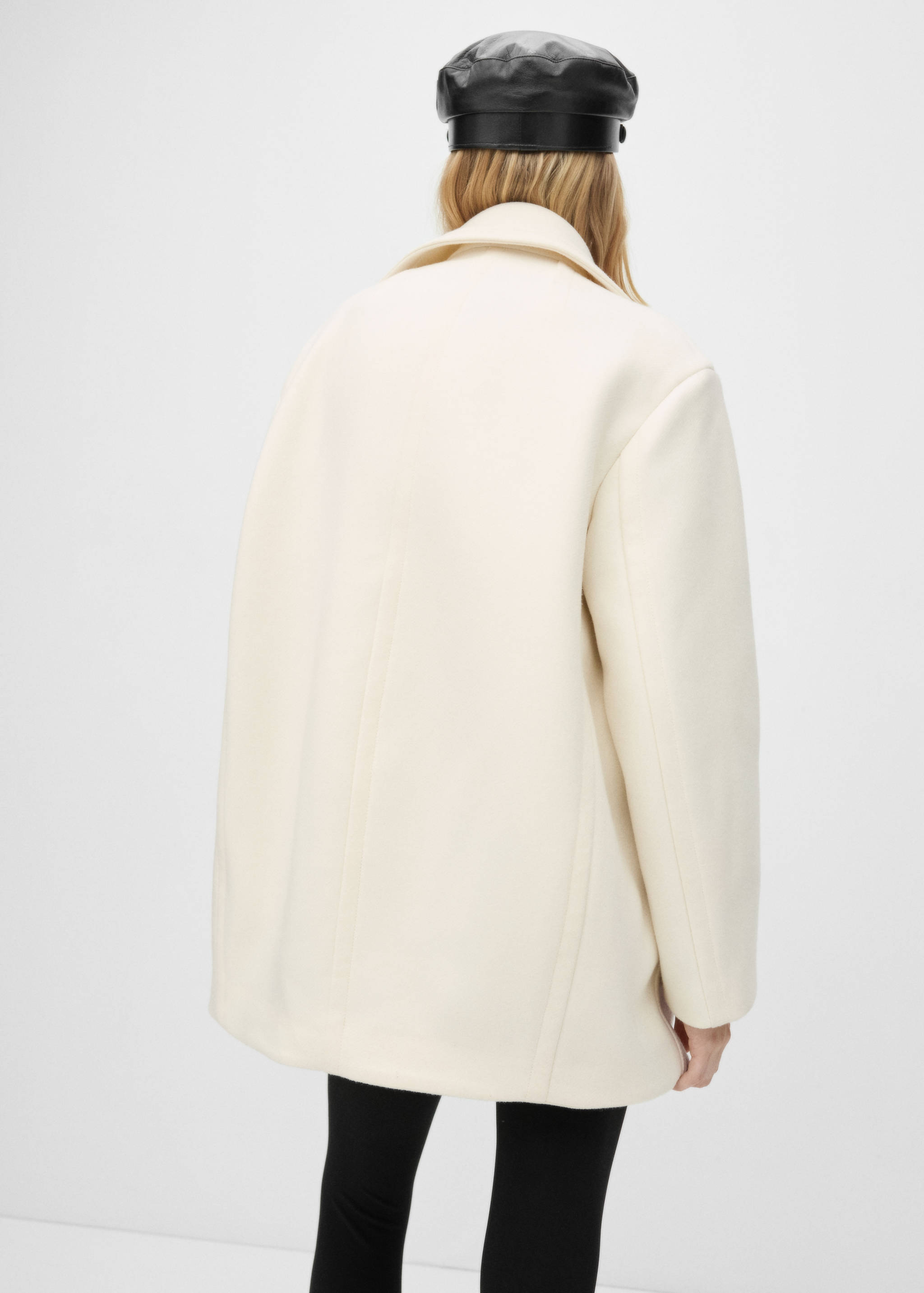 Double-breasted virgin wool coat - Reverse of the article