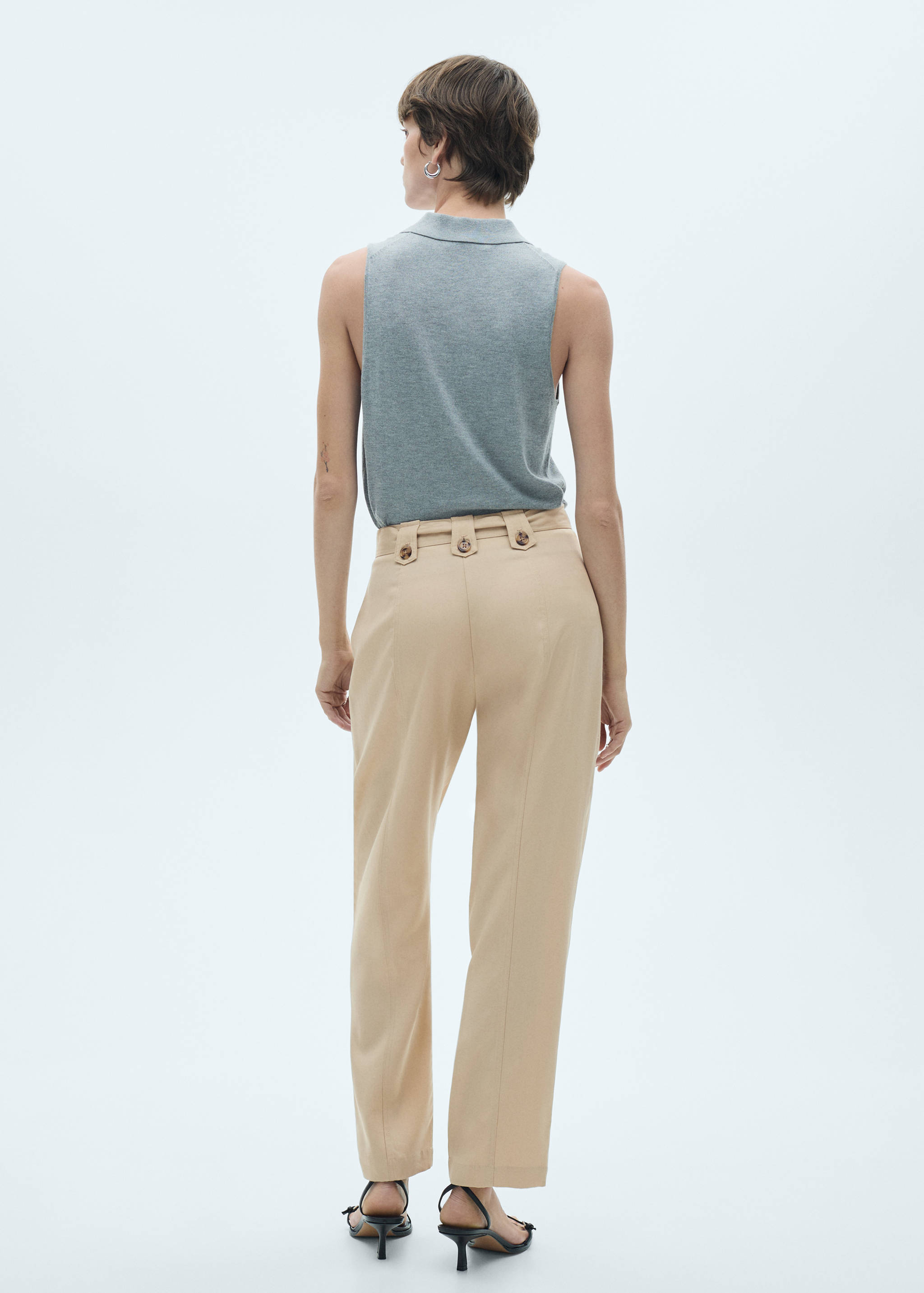 Pants with button loops and bow - Reverse of the article
