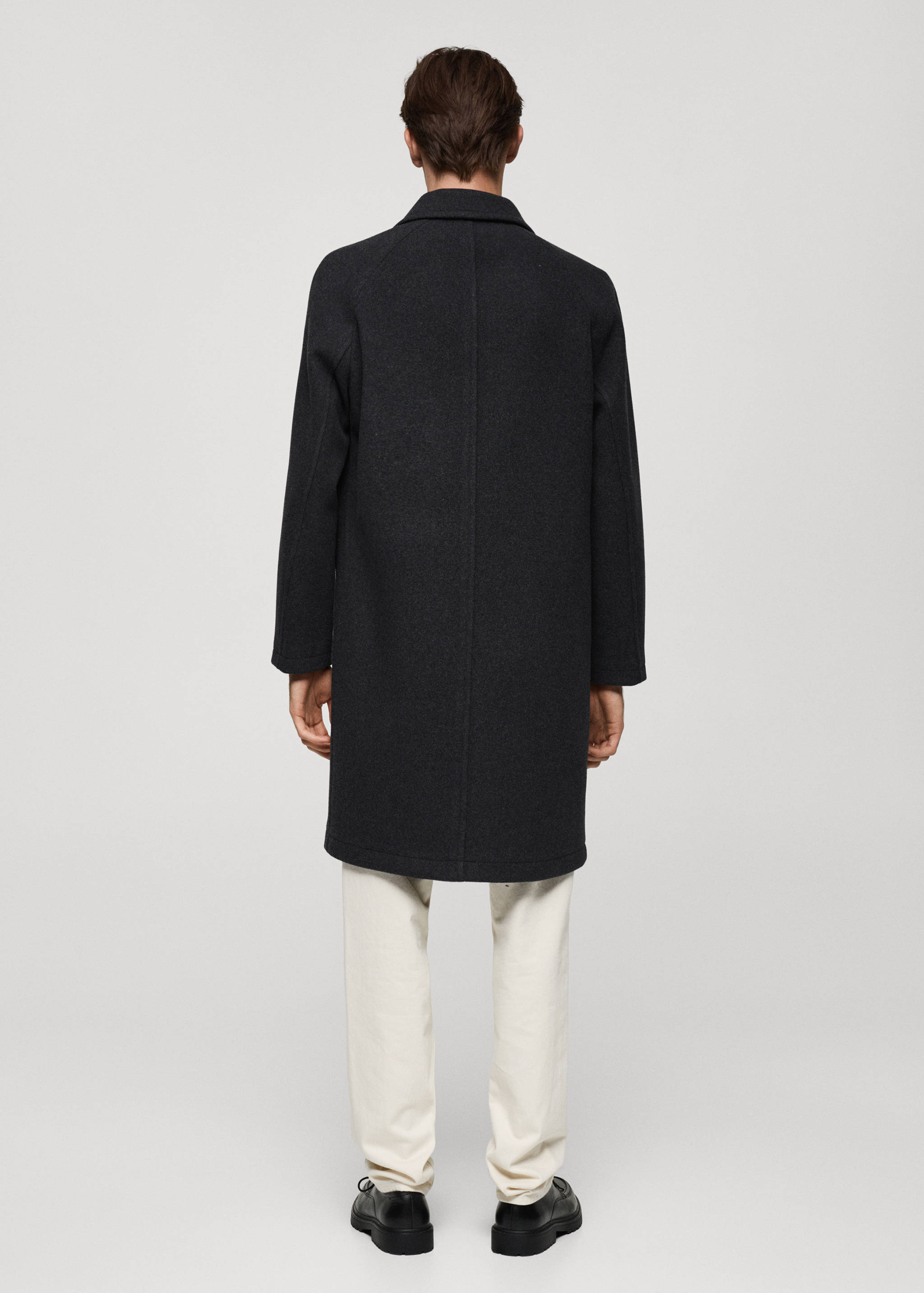 Pocketed wool coat - Reverse of the article