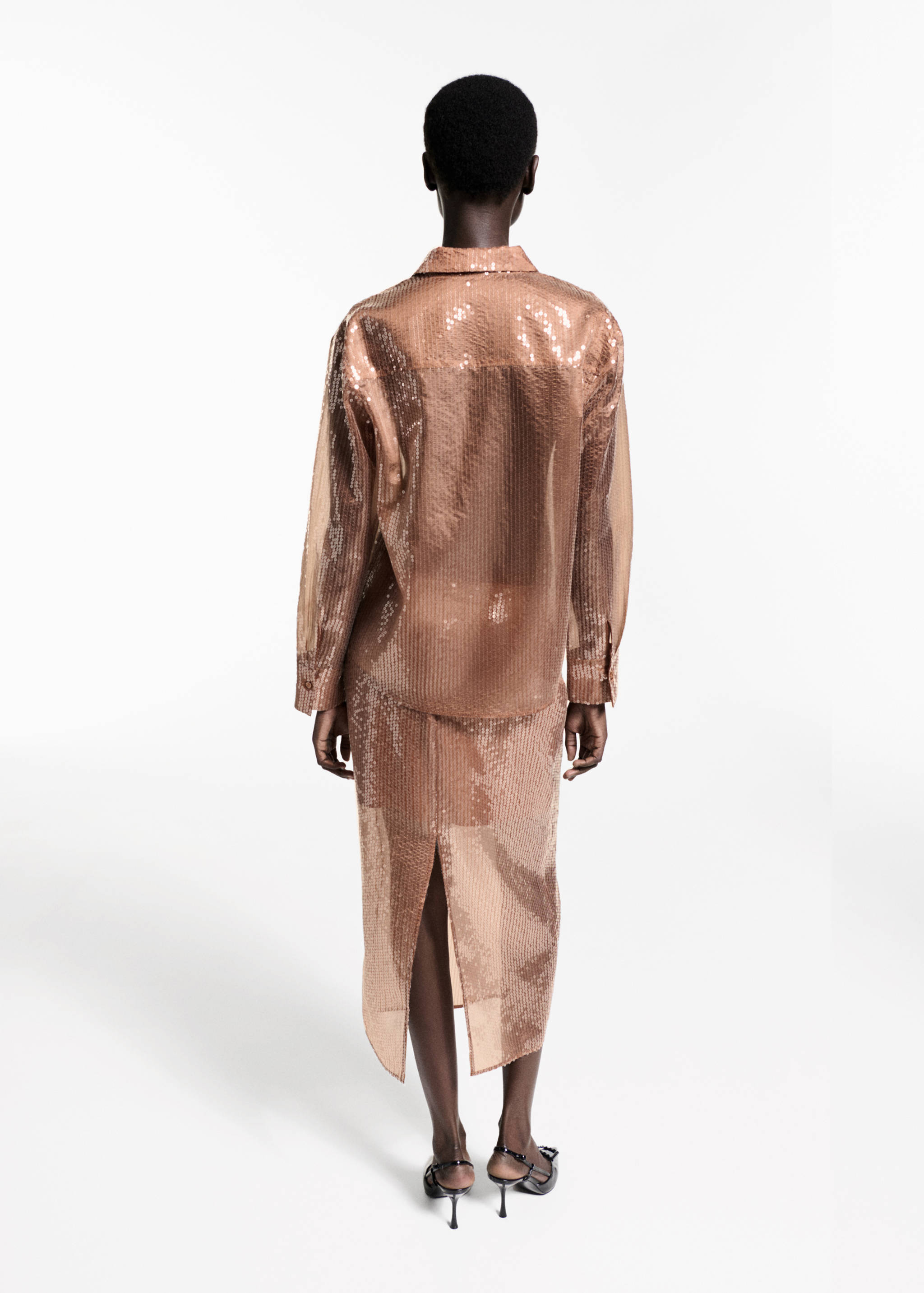Semi-transparent sequined shirt - Reverse of the article