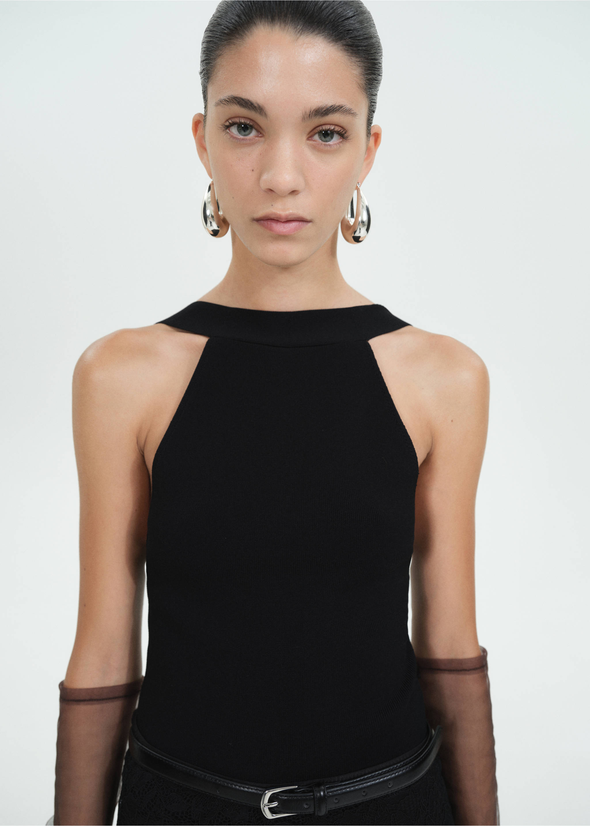 Halter-neck knitted bodysuit - Details of the article 1, Black. Ref: 77039040-00.