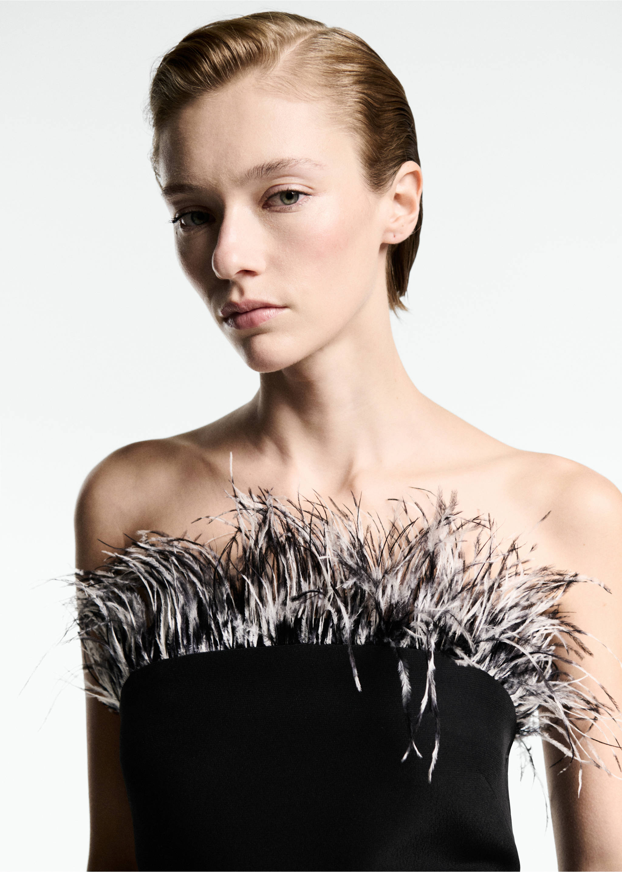 Strapless dress with feather detail - Details of the article 1, Black. Ref: 77039059-00.