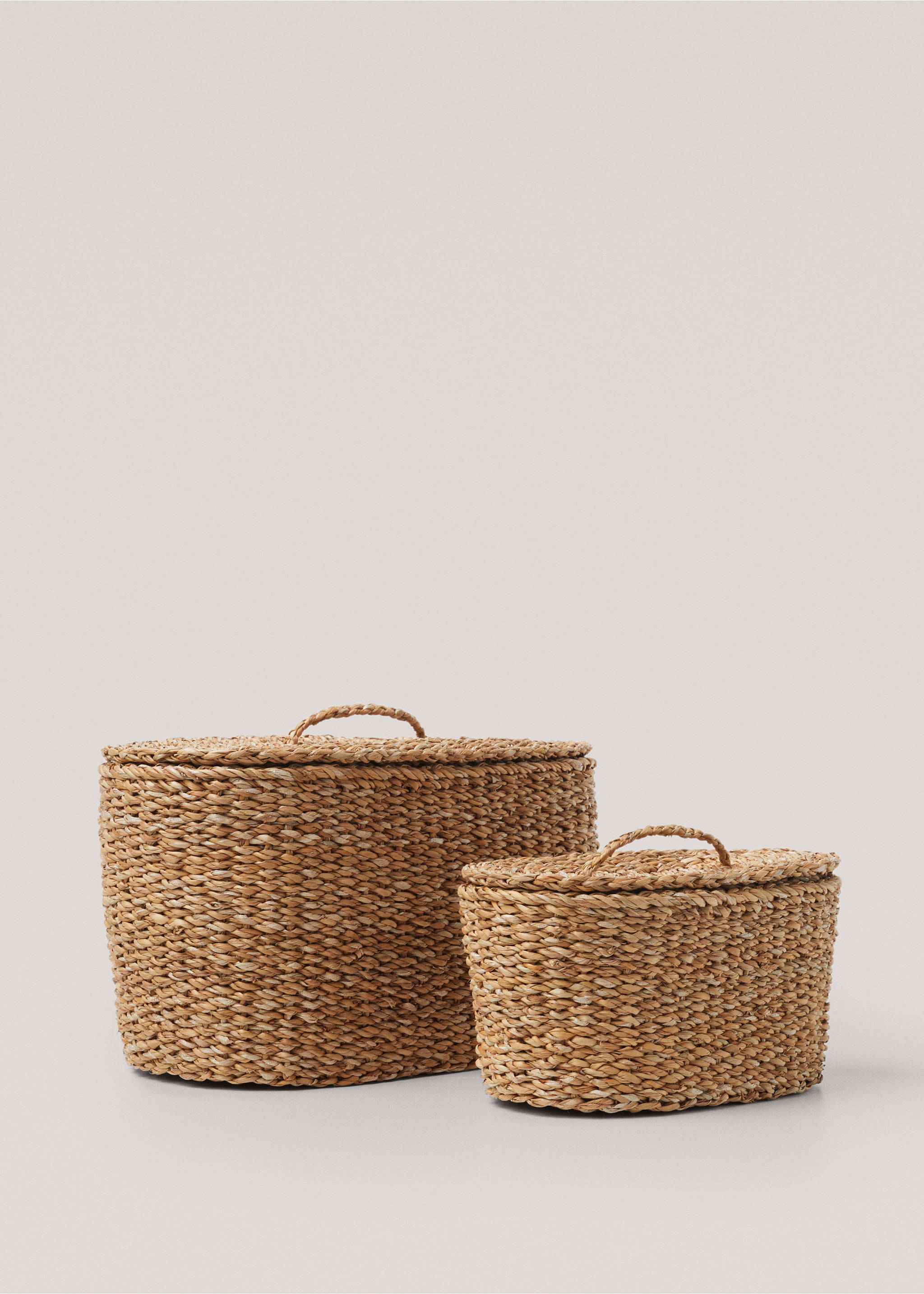 Small natural fibre oval basket - Details of the article 1, Beige. Ref: 77040334-00.