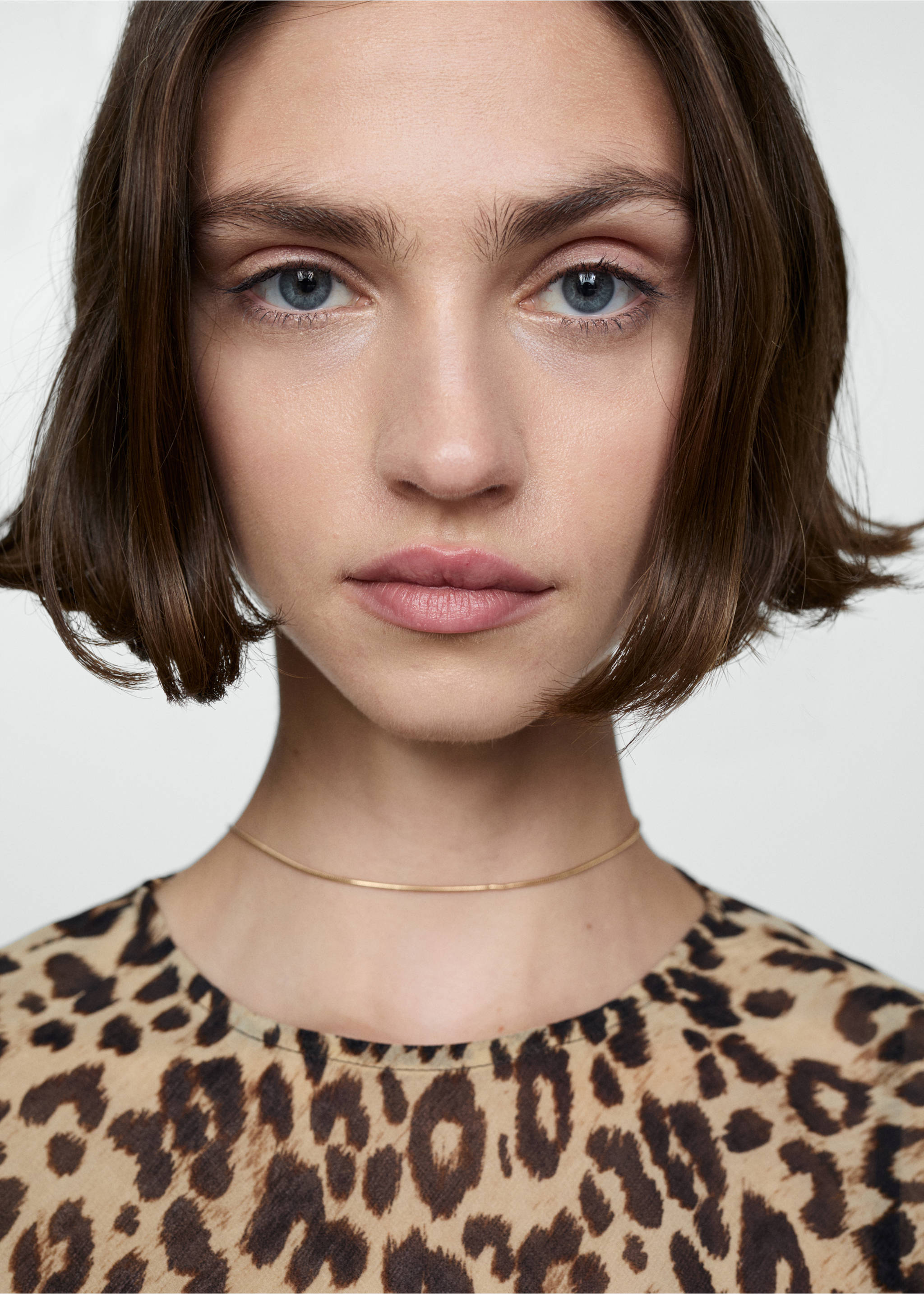 Short leopard-print dress - Details of the article 1, Black. Ref: 77040377-00.