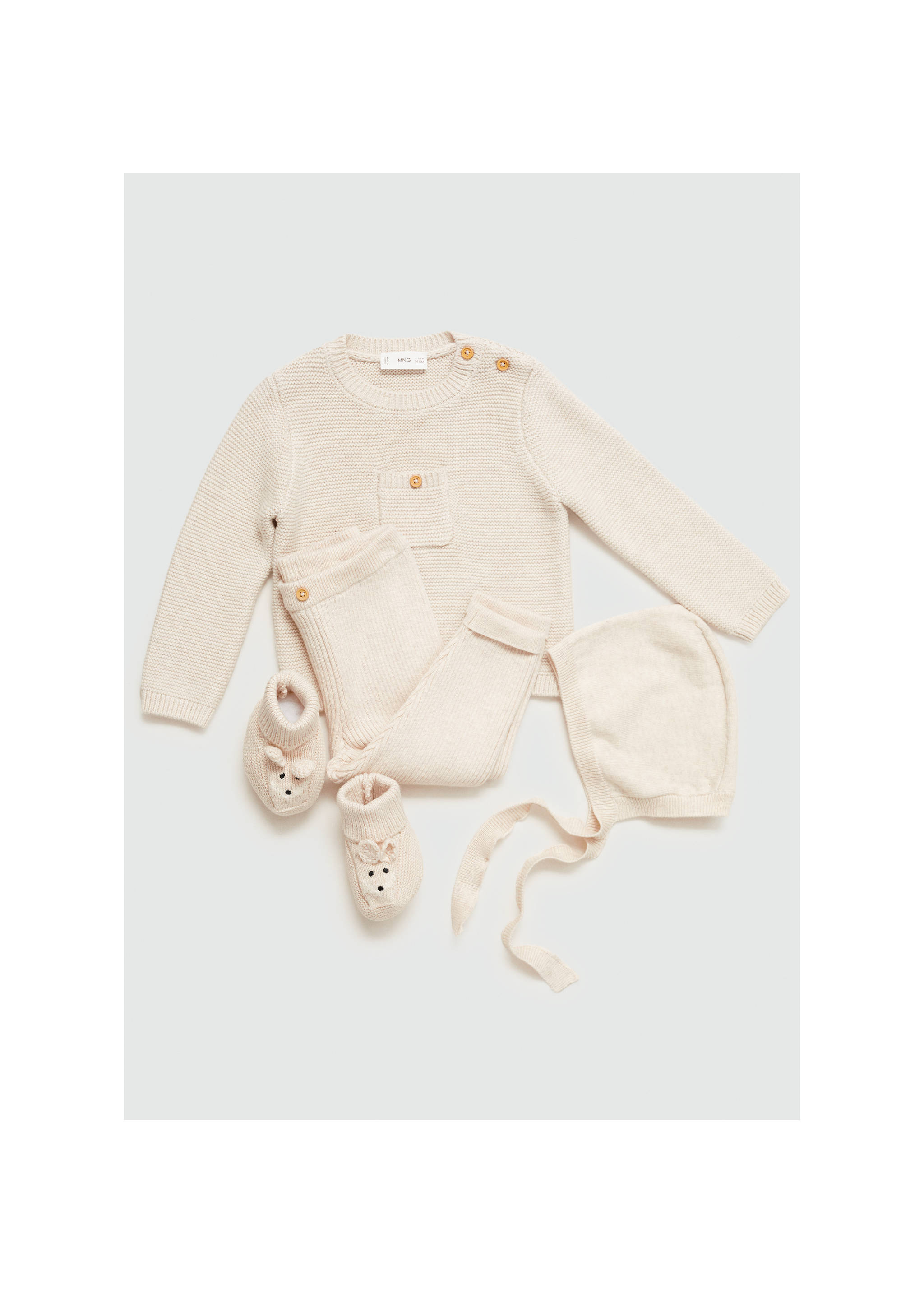 Knit pocket sweater - Details of the article 1, Sand. Ref: 77044054-00.