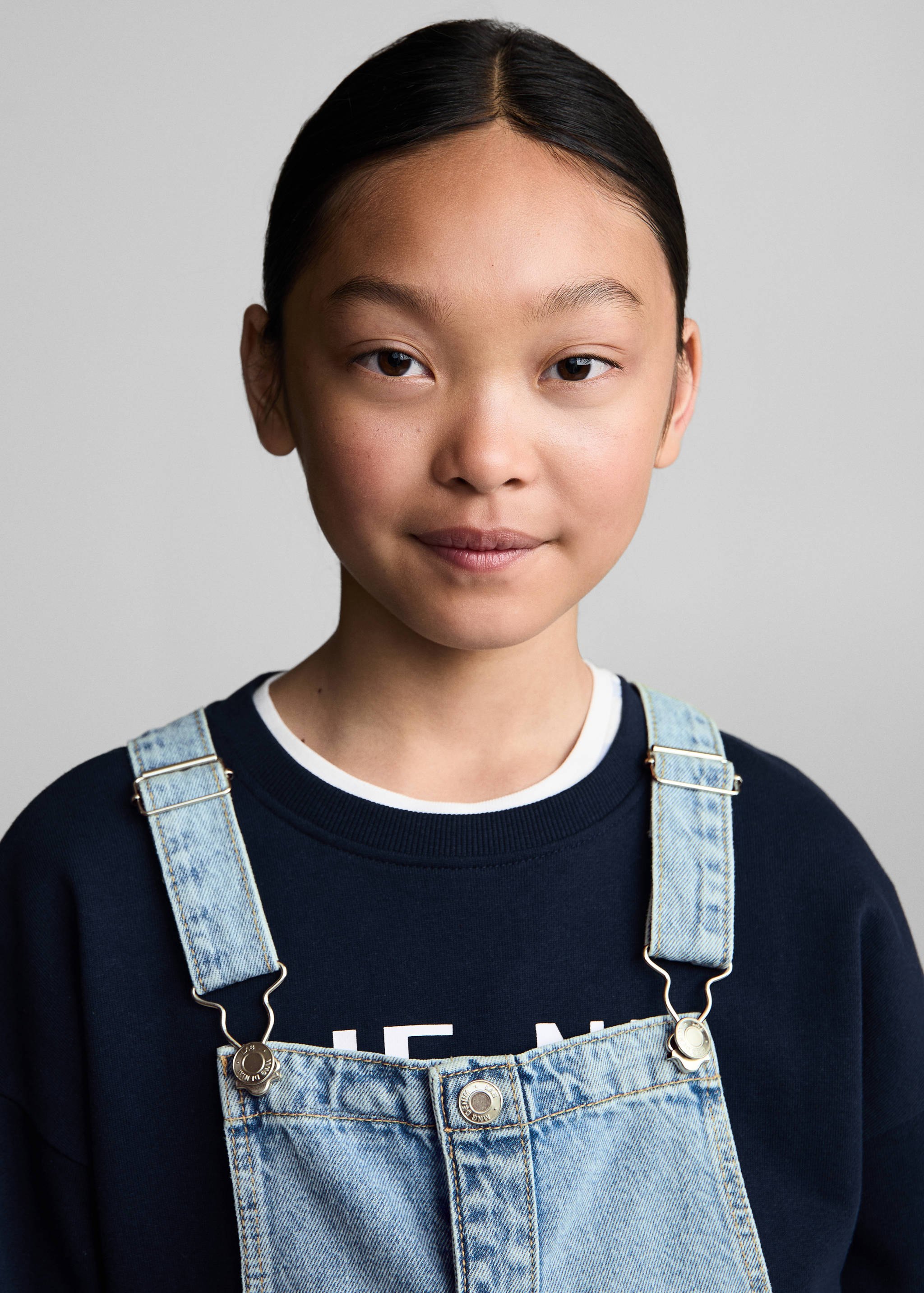 Short denim pinafore - Details of the article 1