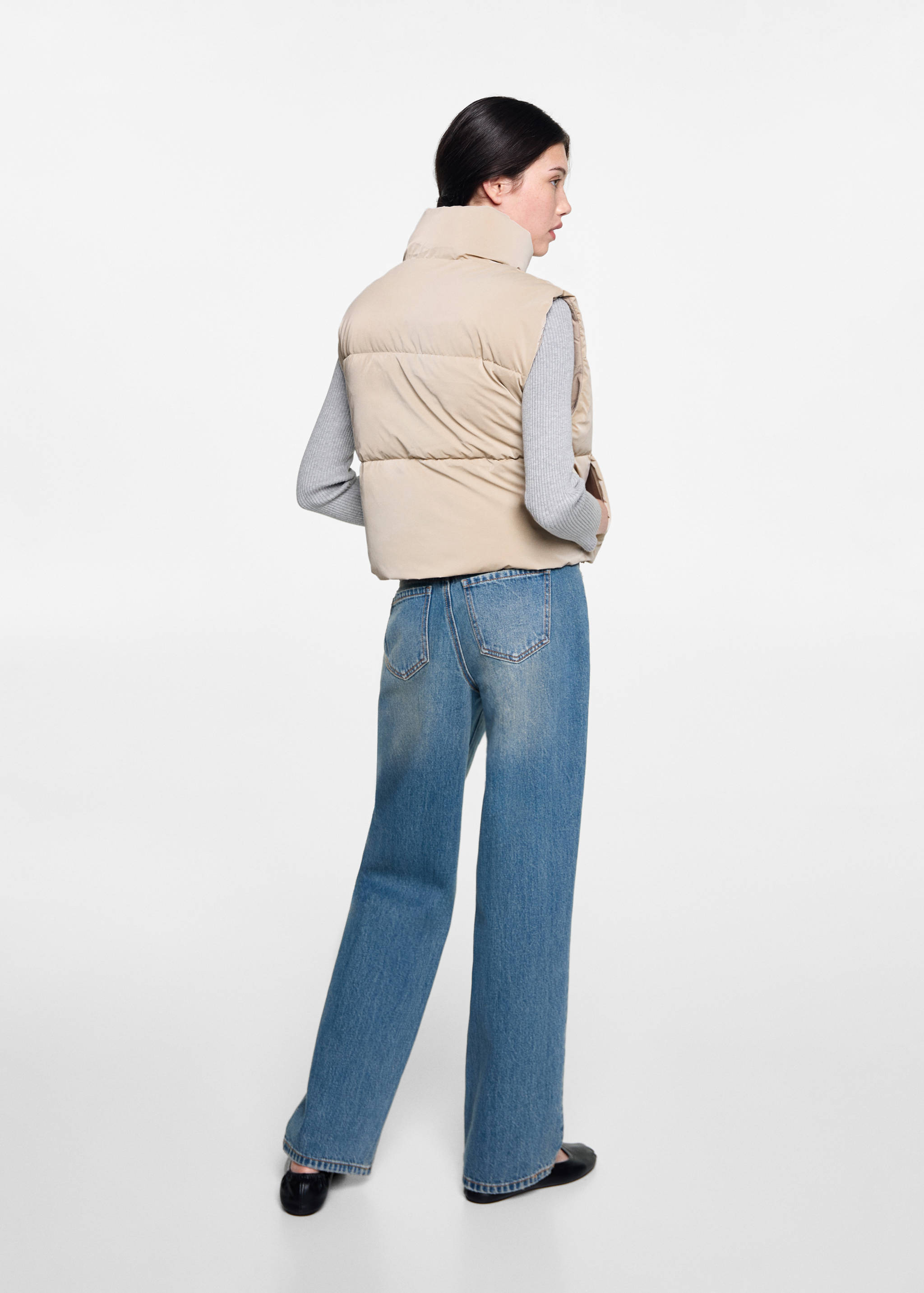 Quilted gilet with pockets - Reverse of the article