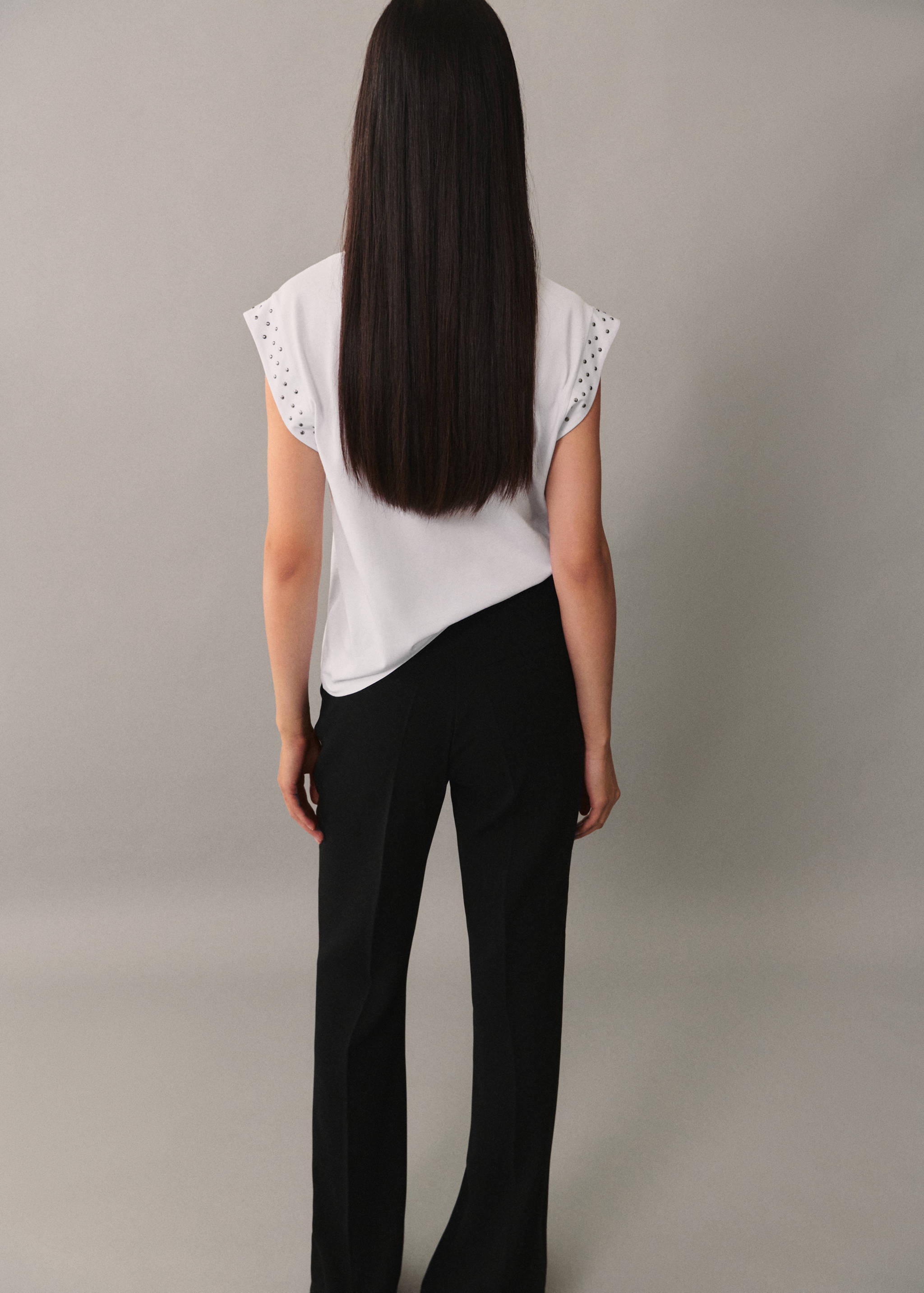 Camiseta sin mangas tachuelas - Reverso del artículo