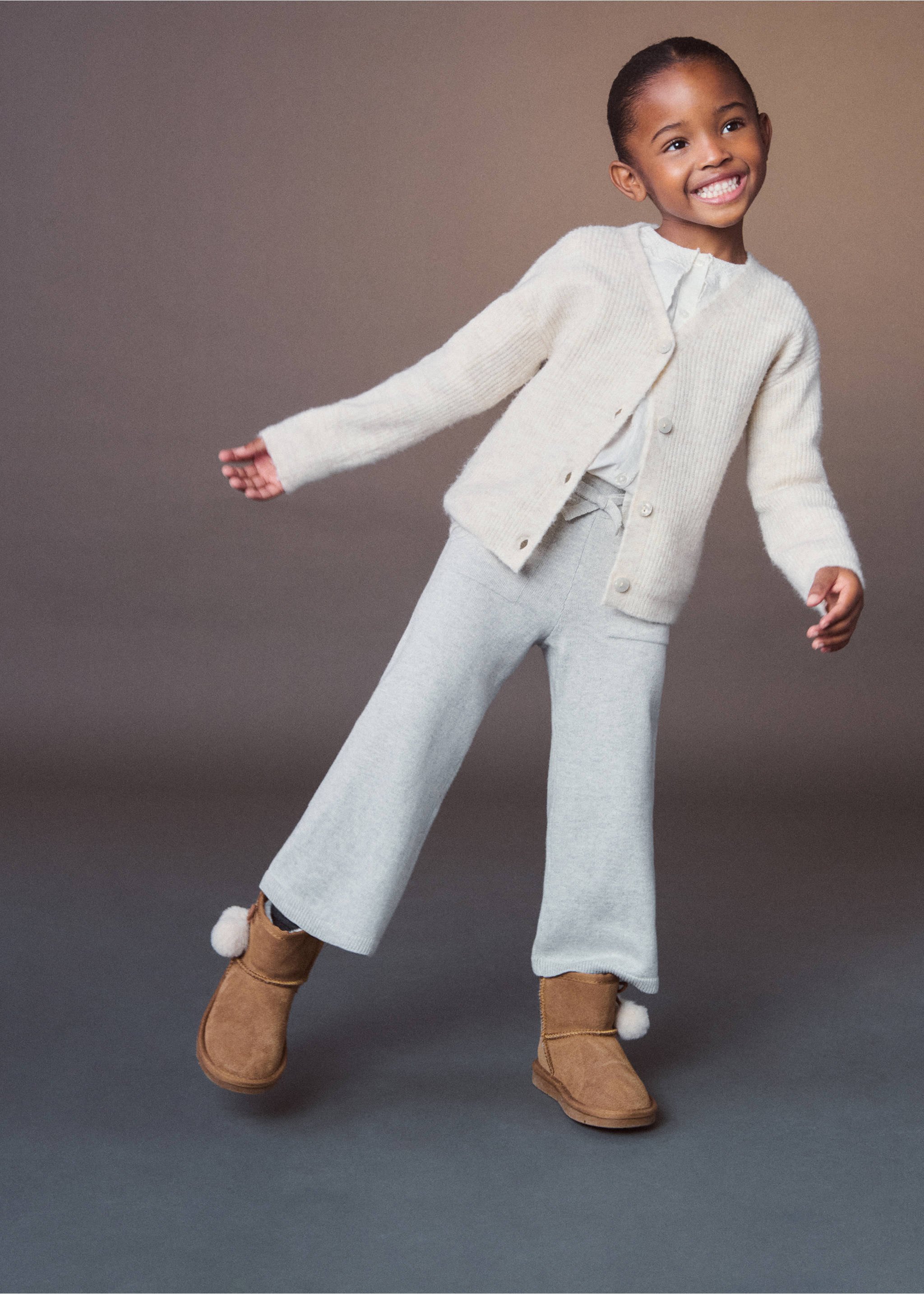 Buttoned ribbed cardigan - Details of the article 6, Beige. Ref: 77046338-00.