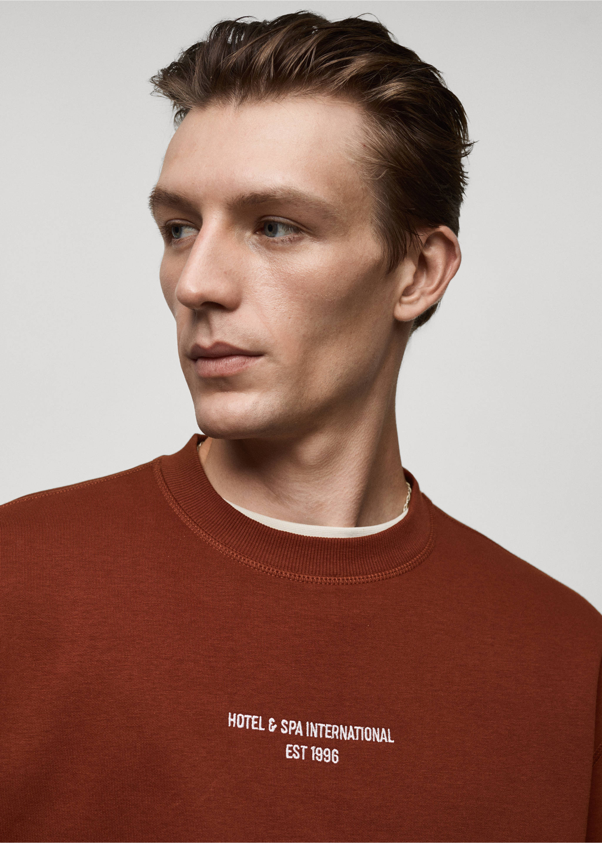 Relaxed-fit sweatshirt with text print - Details of the article 1, Burnt Orange. Ref: 77047922-00.