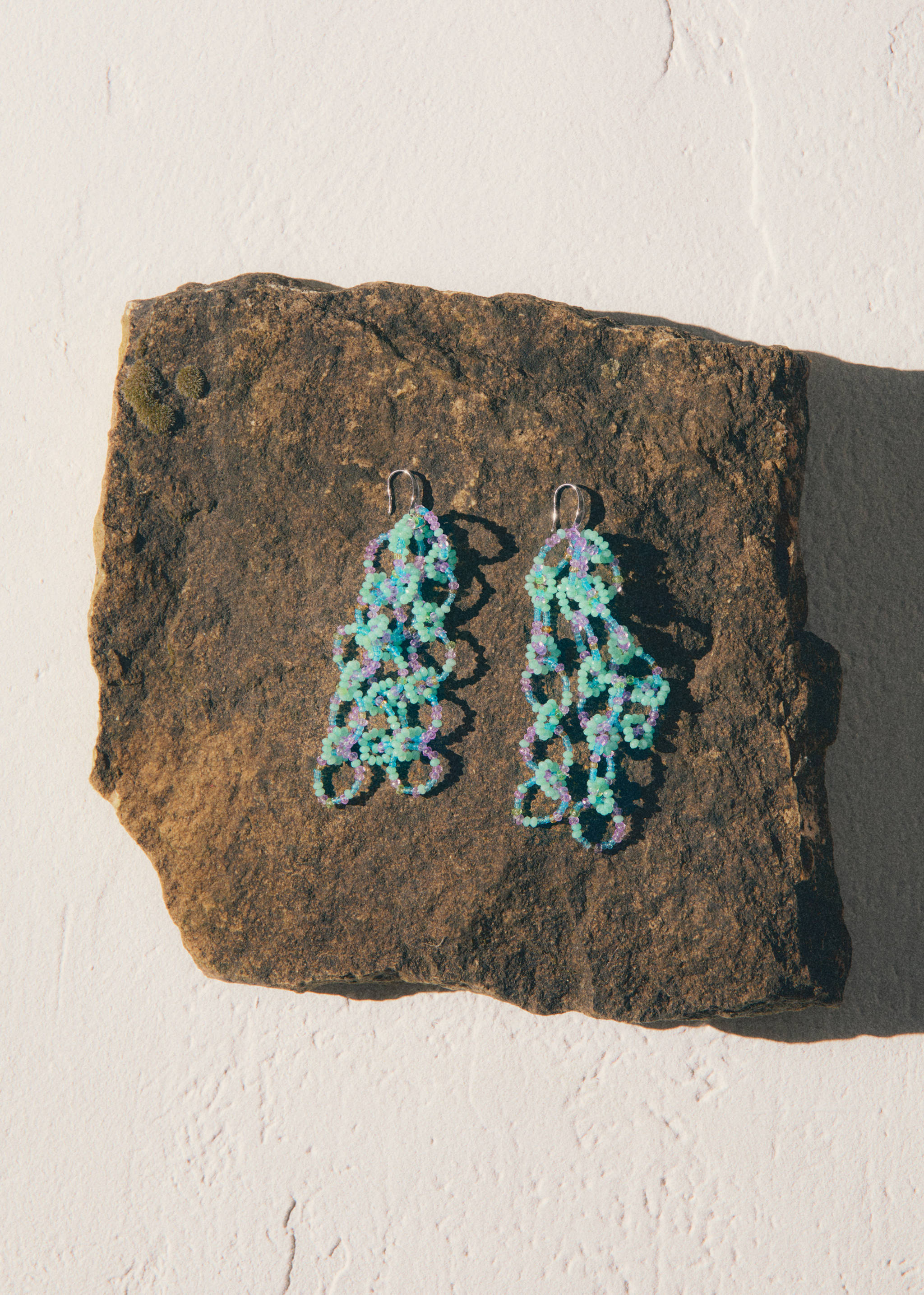 Ohrringe mit Perlenanhänger - Detail des Artikels 6