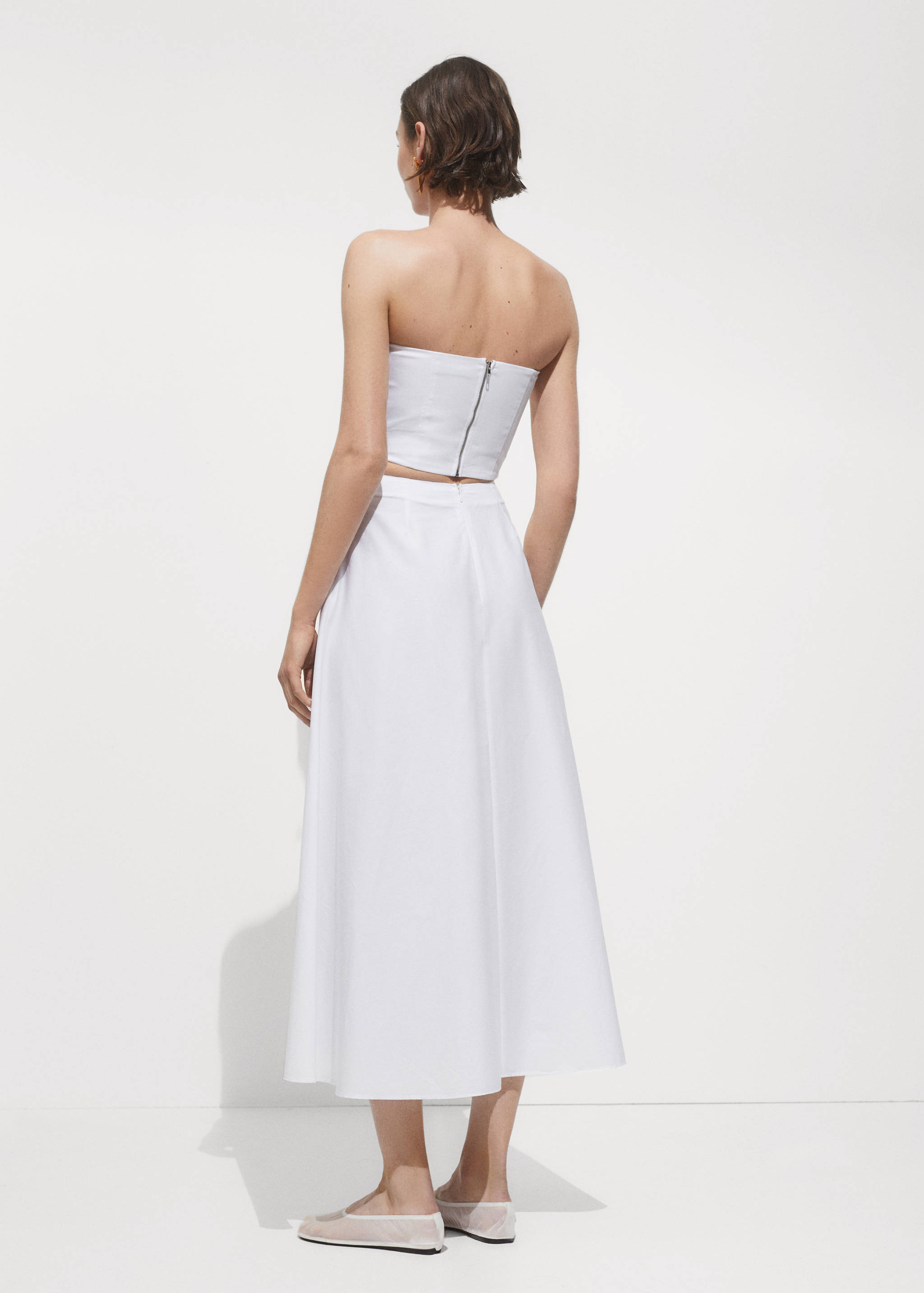 Long flared skirt - Reverse of the article