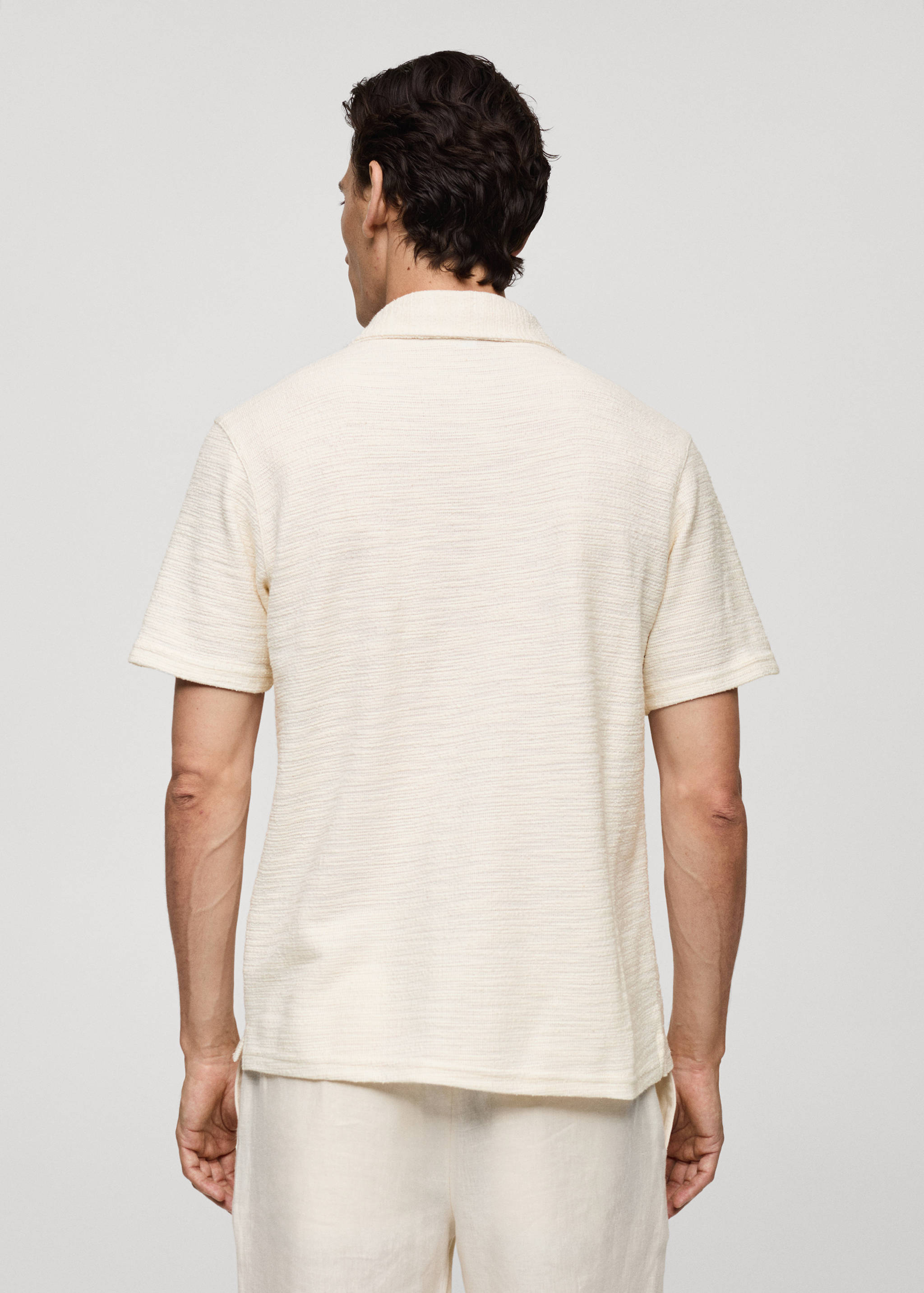 Regular-fit textured knitted polo shirt - Reverse of the article
