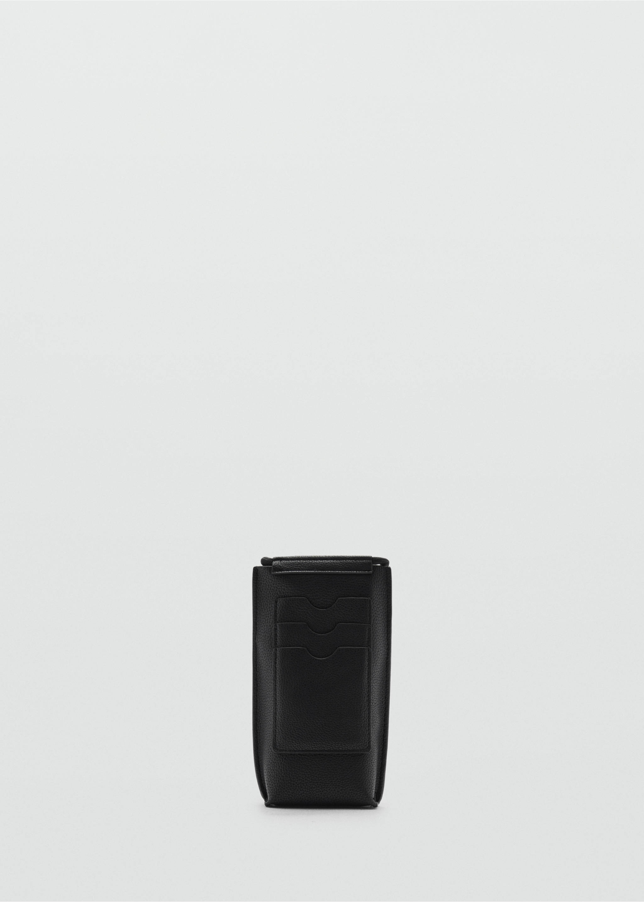 Mini-Schultertasche mit Narbenleder-Effekt - Detail des Artikels 1, Schwarz. Ref: 77052543-00.