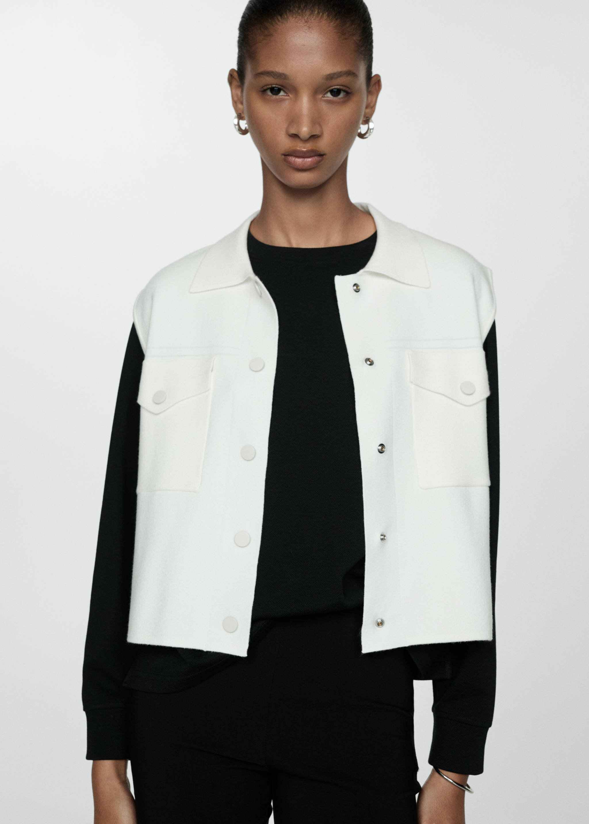 Knitted waistcoat with pockets - Medium plane