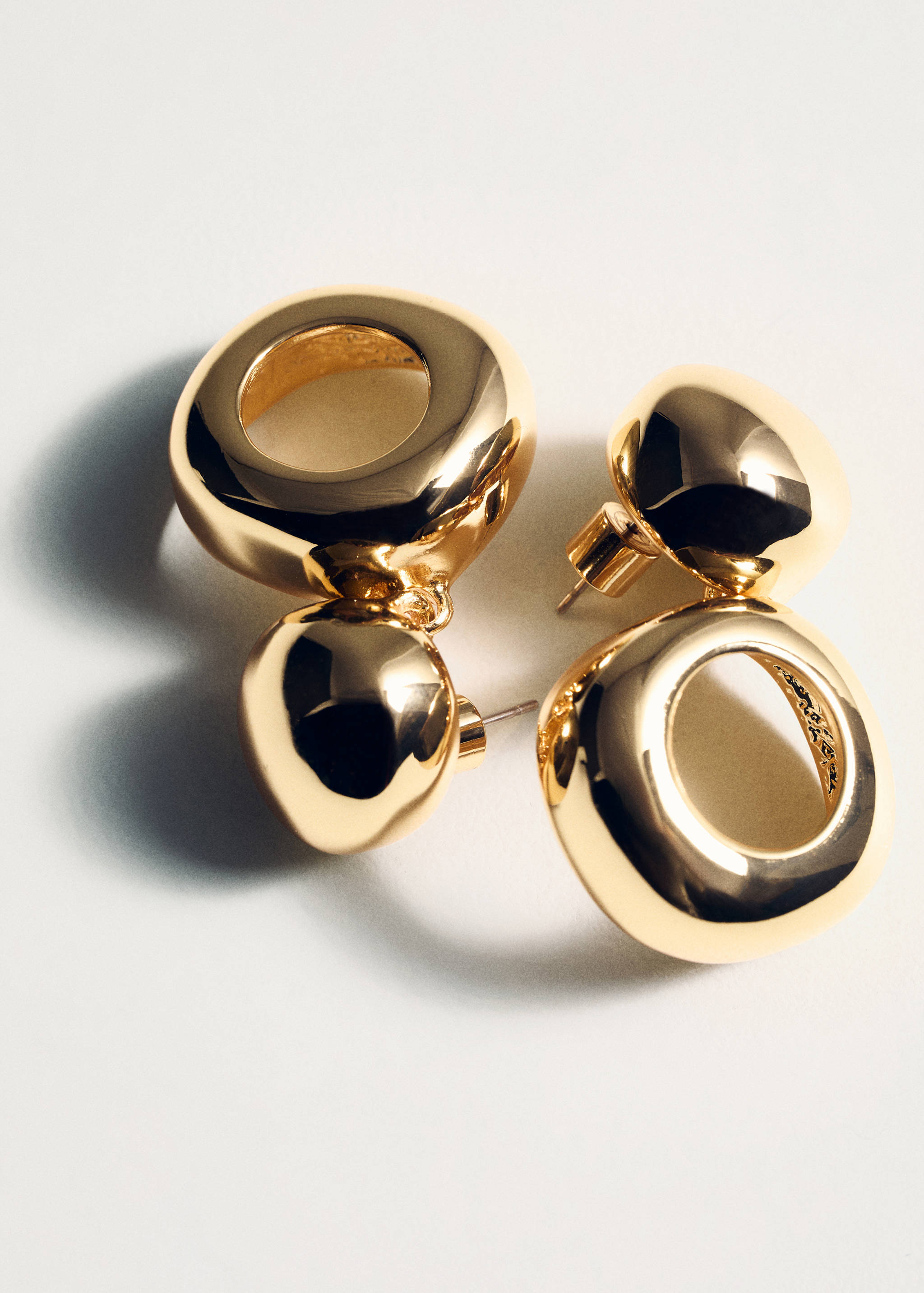 Ohrringe mit kreisförmigem Design - Detail des Artikels 5