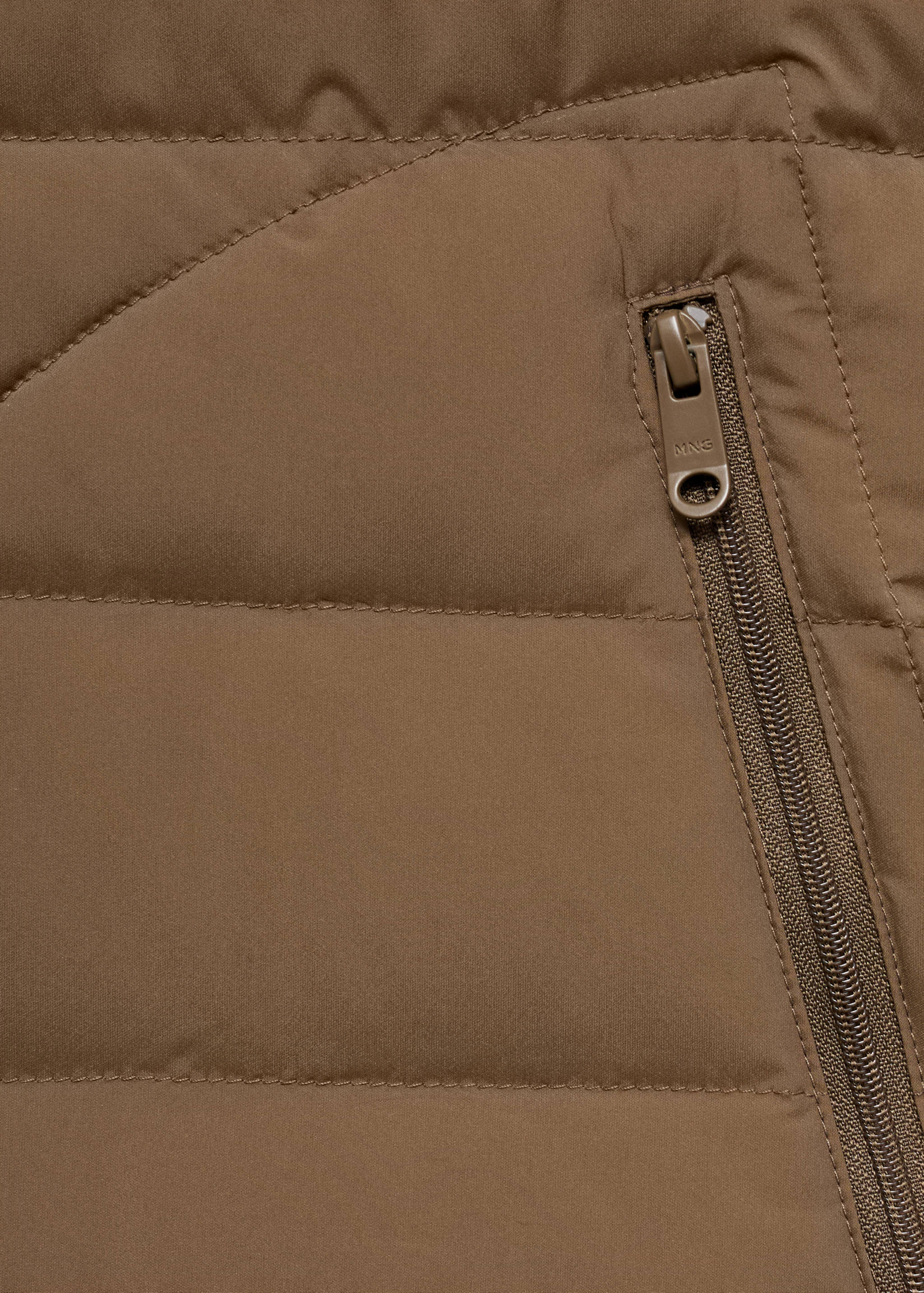 Täckväst fjäderstoppning - Detaljer om artikeln 8